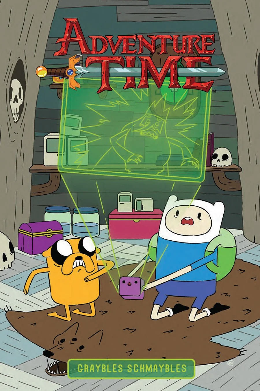 The cover of Adventure Time featuring Finn and Jake in their treehouse with Skull and other items, showing a digital display of Gunter and the Ice King, with the title and author's name, Graybles Schmables.