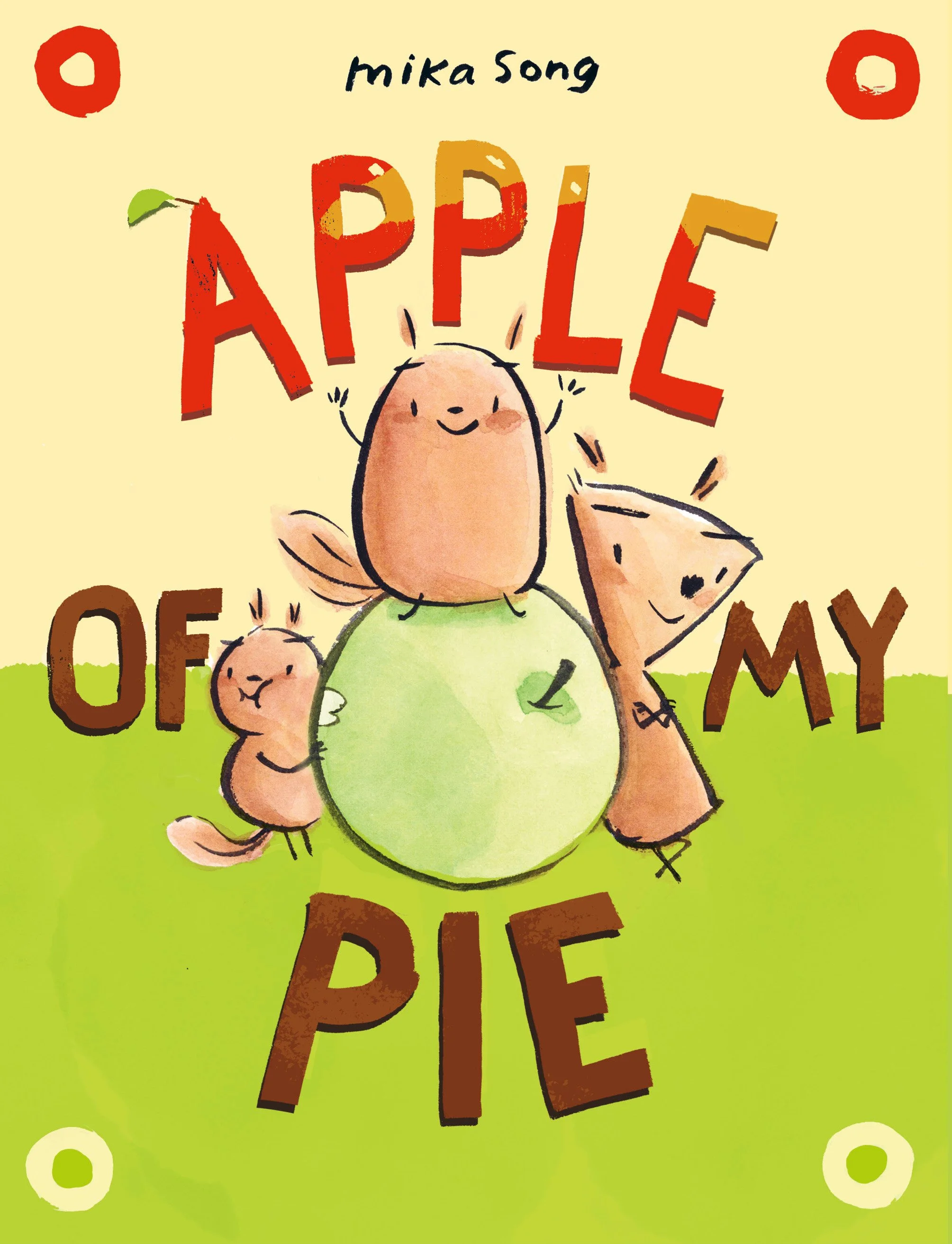 Cover of a children's book titled "Apple of My Pie" by Mika Song with cartoon illustrated animals, including an apple, a peach, a rabbit, and a fox, standing on a grassy field.