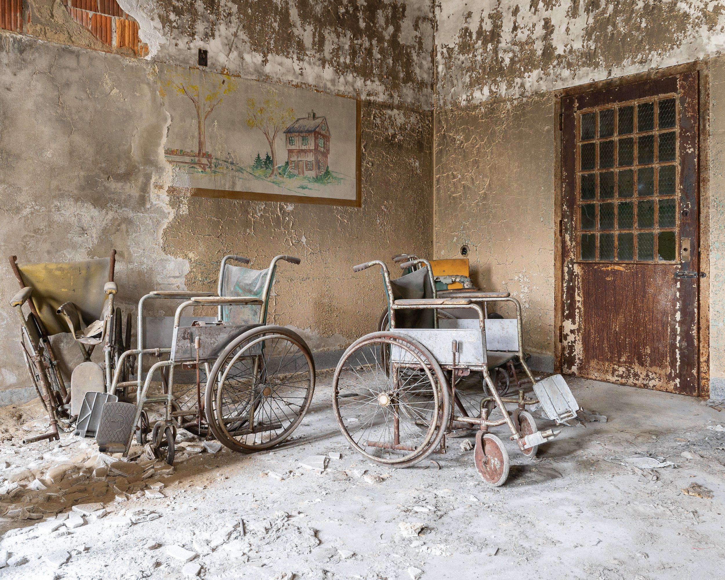 Forgotten Wheelchairs Under the Forgotten House, Building 25