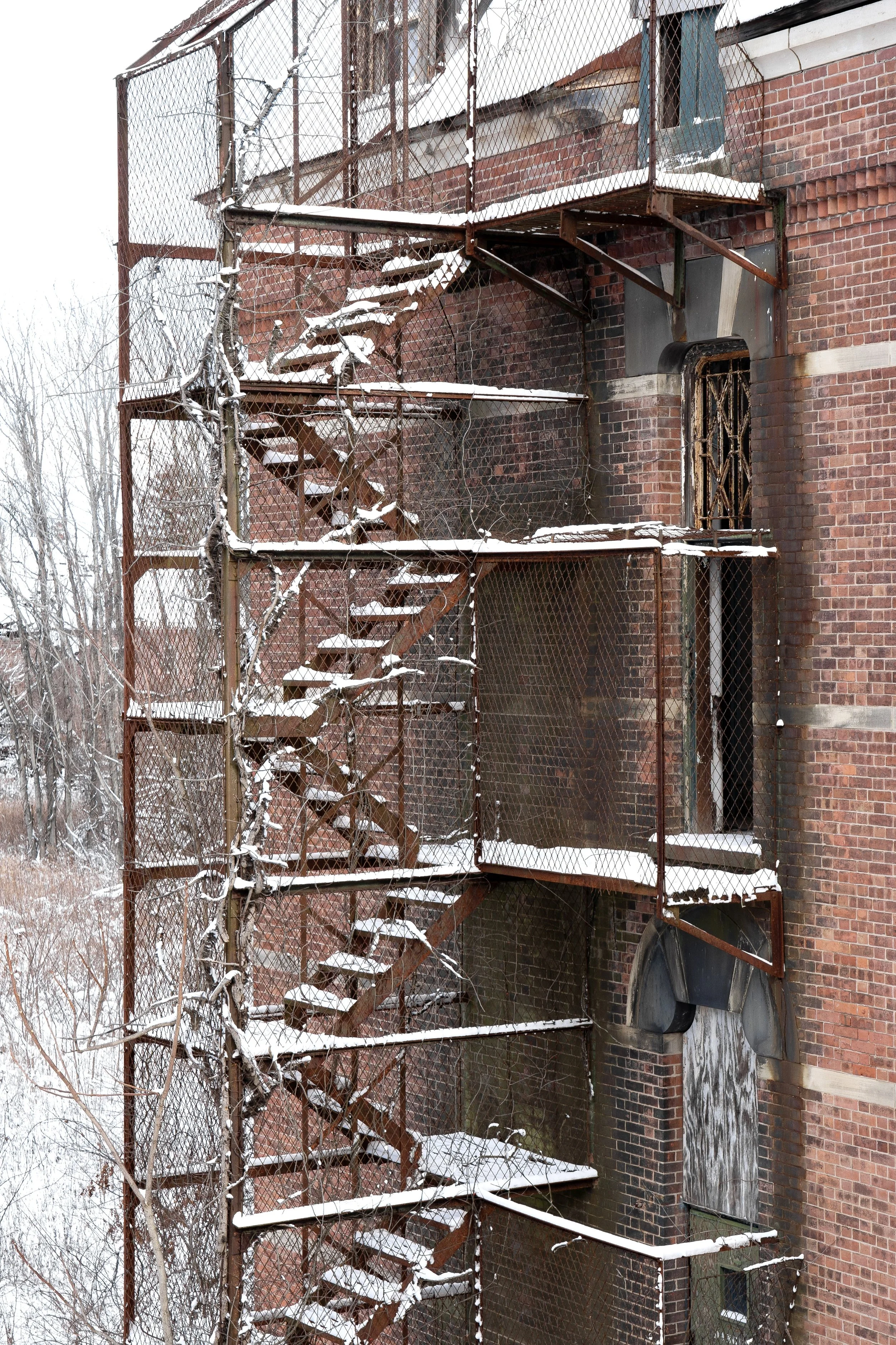 Male Wing Fire Escape in the Snow