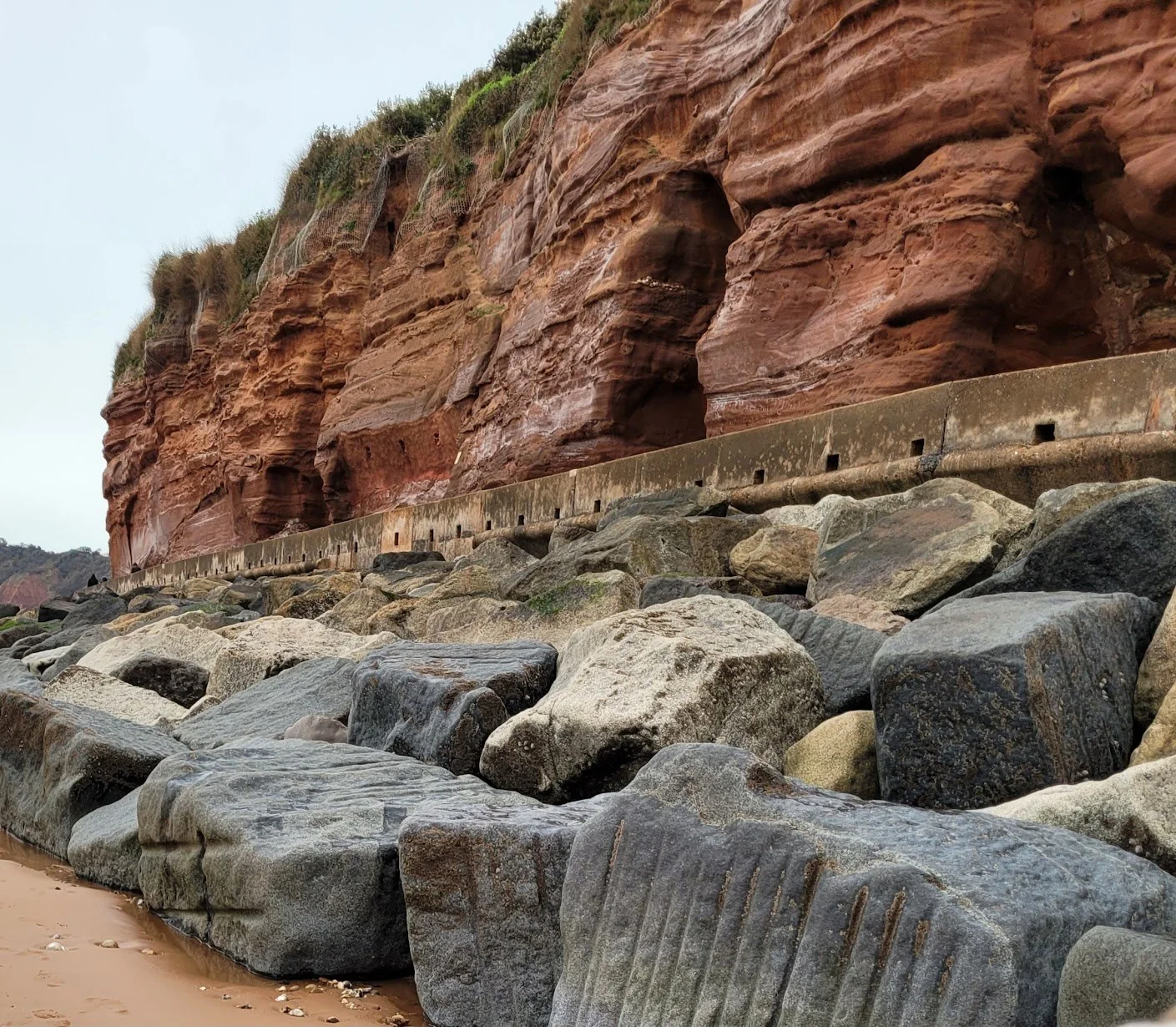 Capturing the Crimson Coast: Why Sidmouth’s Red Cliffs Dominate My Abstract Landscape