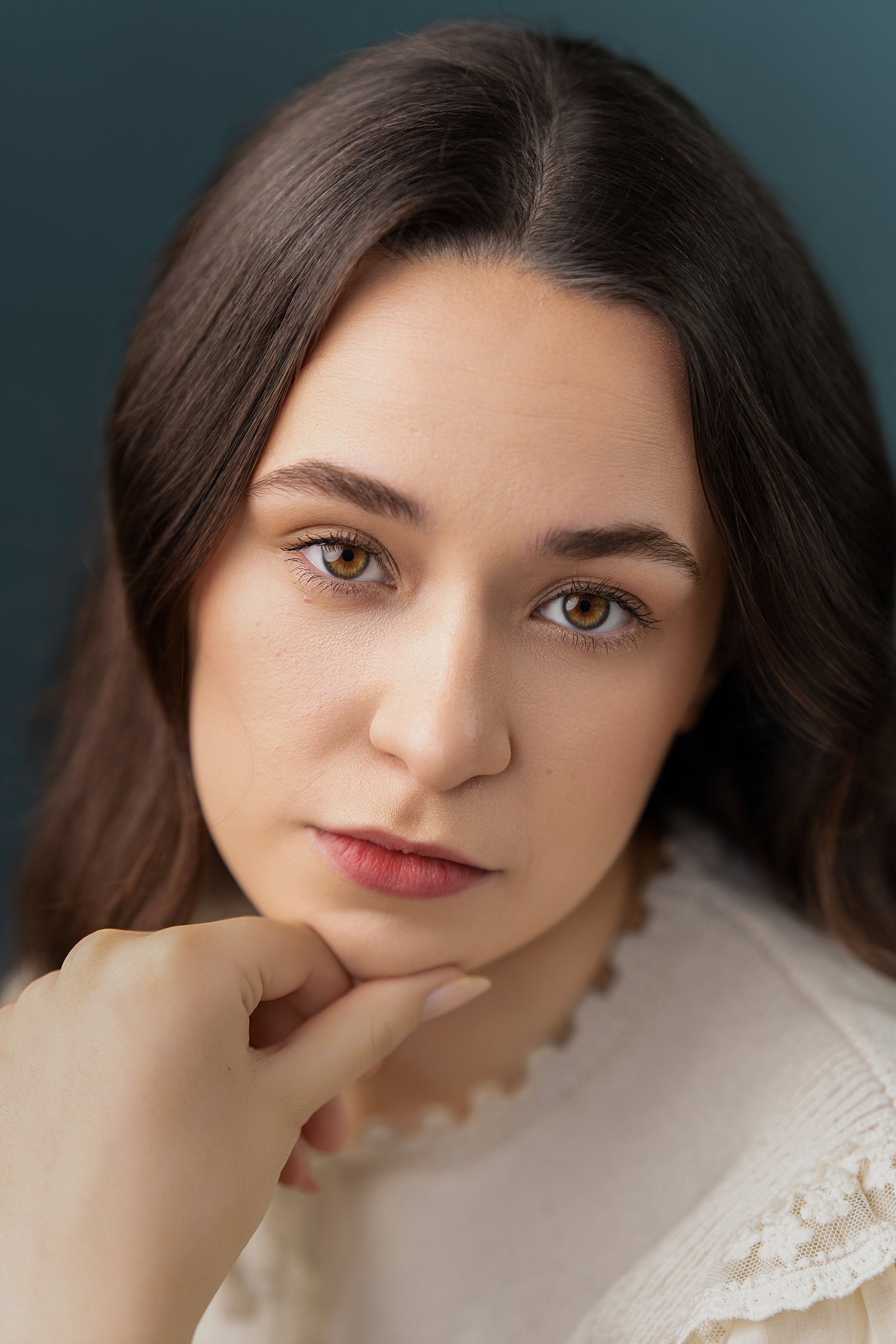 Professional female headshot portrait with a natural smile, photographed by Zsolt Santa Photography in Canterbury, Kent, UK