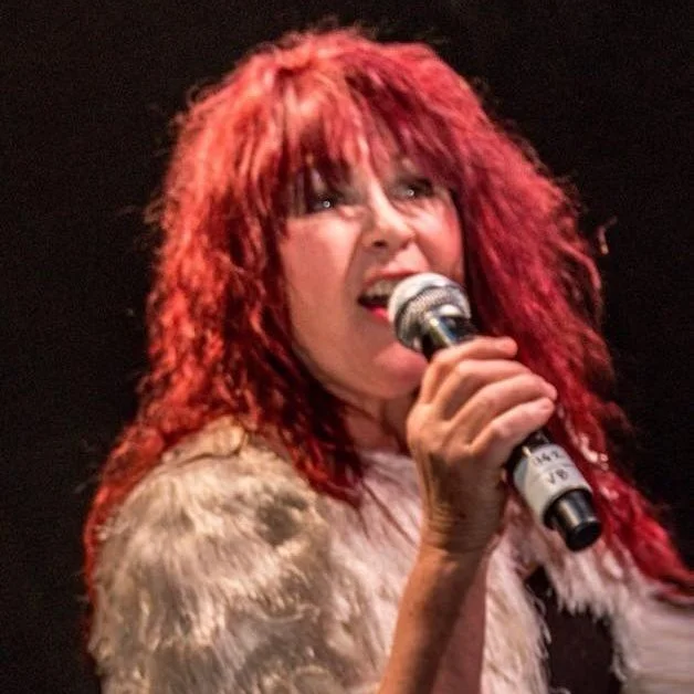 Laurie Beebe Lewis Singing.jpg