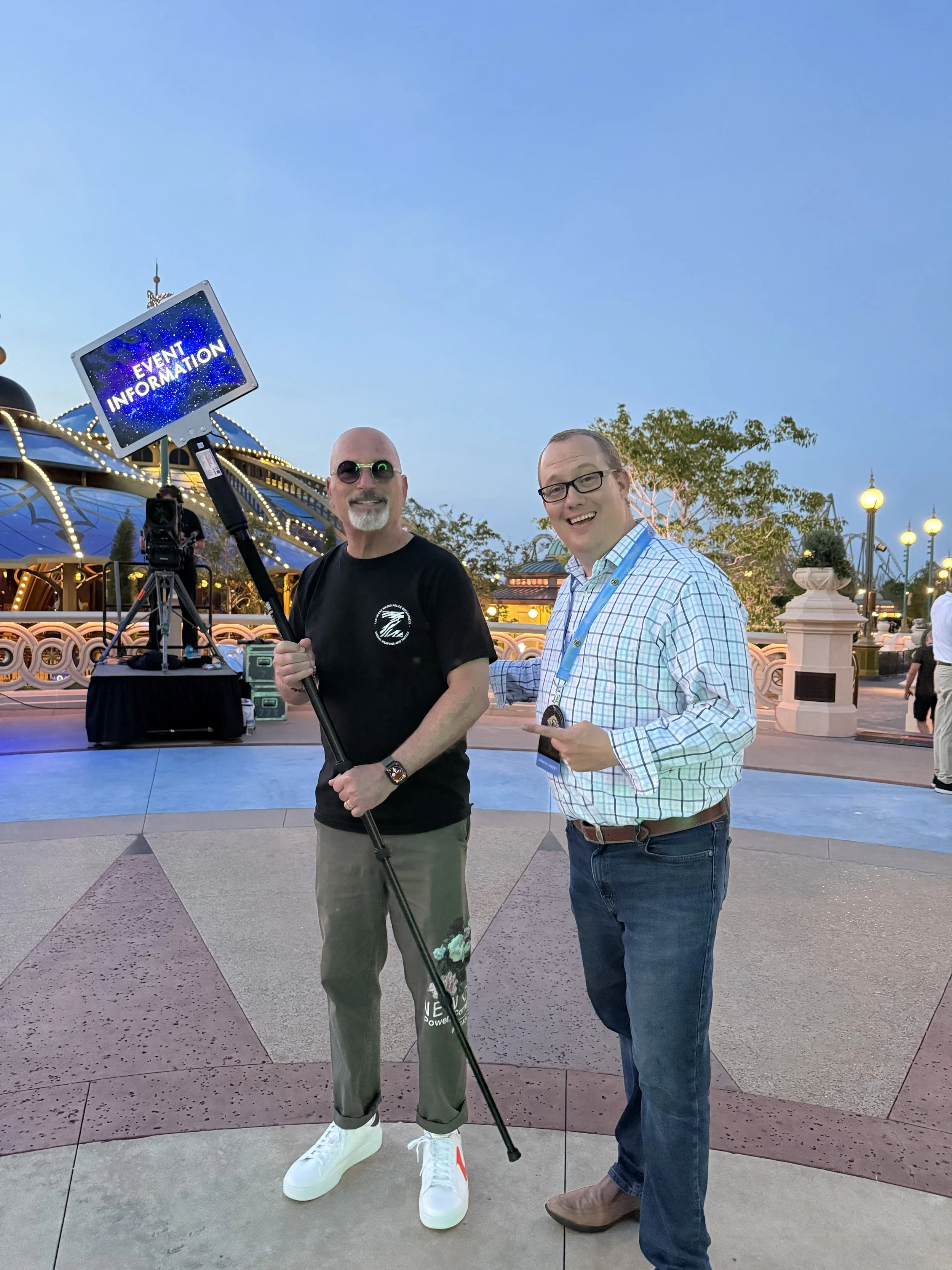 Matthew Miller, America's Theme Park Technologist, with Howie Mandel at the Universal Epic Universe celebrity grand opening event, featured by Access Hollywood and archived on IMDb.
