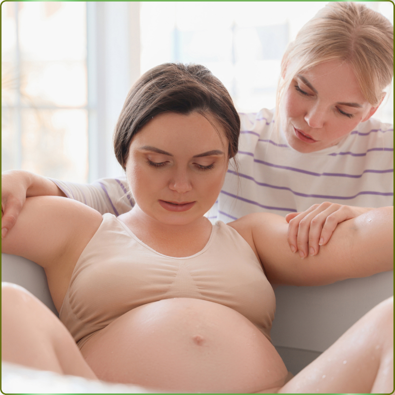 Birth doula providing labor support for a mother in Cleveland