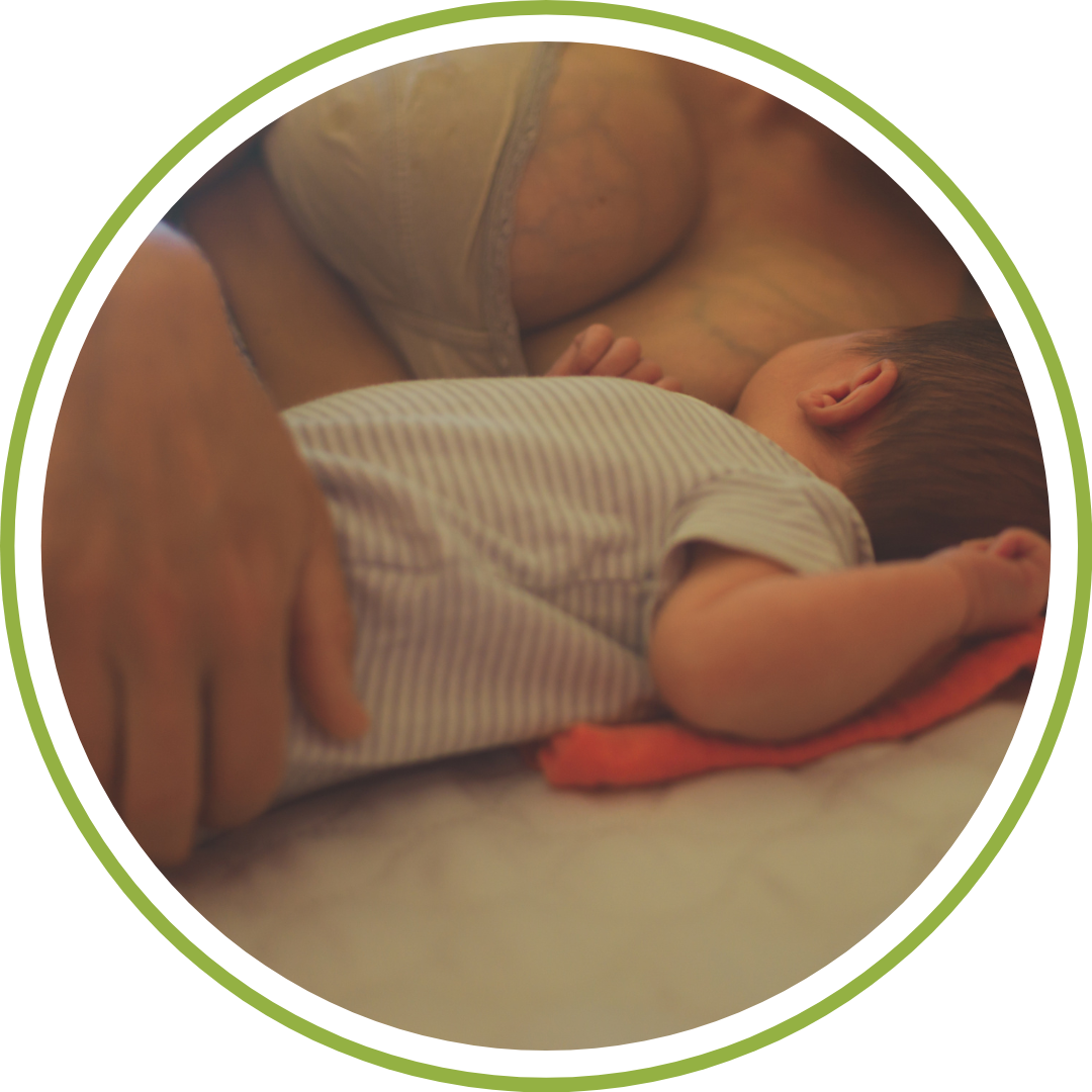 Cleveland night nanny working as an overnight doula helping mom breastfeed