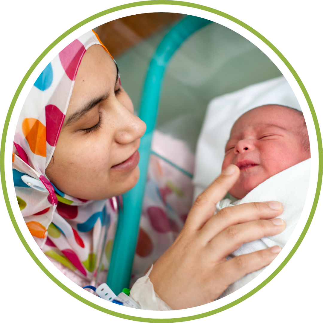 mom roomin in with her newborn at Hillcrest Hospital