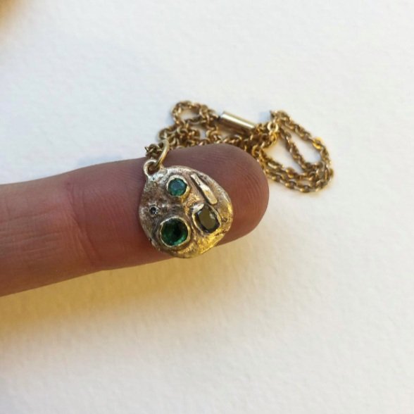 Grey Diamond, Salt and Pepper Diamond and Emeralds on 18 carat Gold