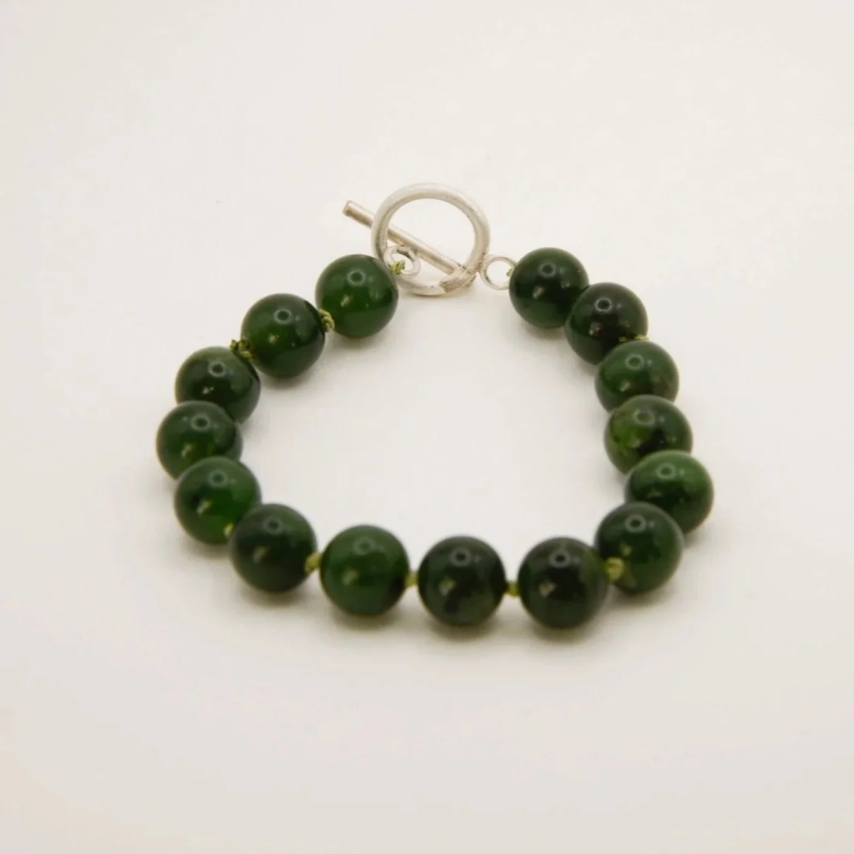 Jade Bead Bracelet on Knotted Silk