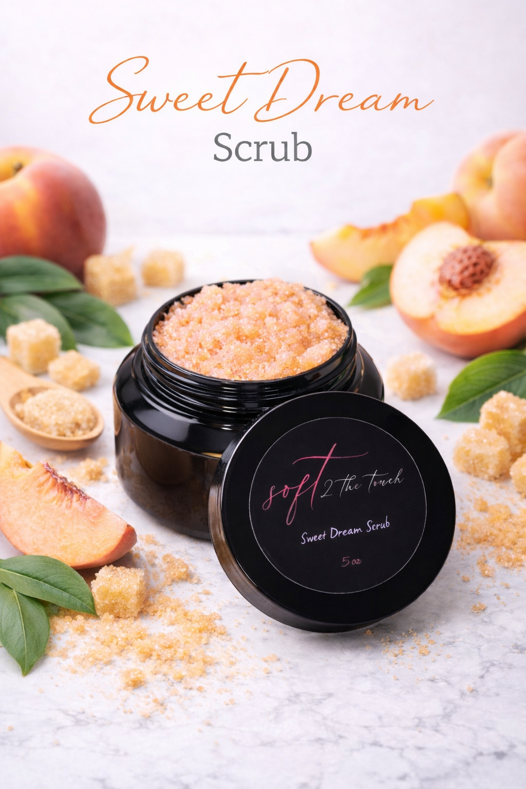 A jar of peach-colored sweet dream scrub with some scoops and ingredients around, including peaches and green leaves.