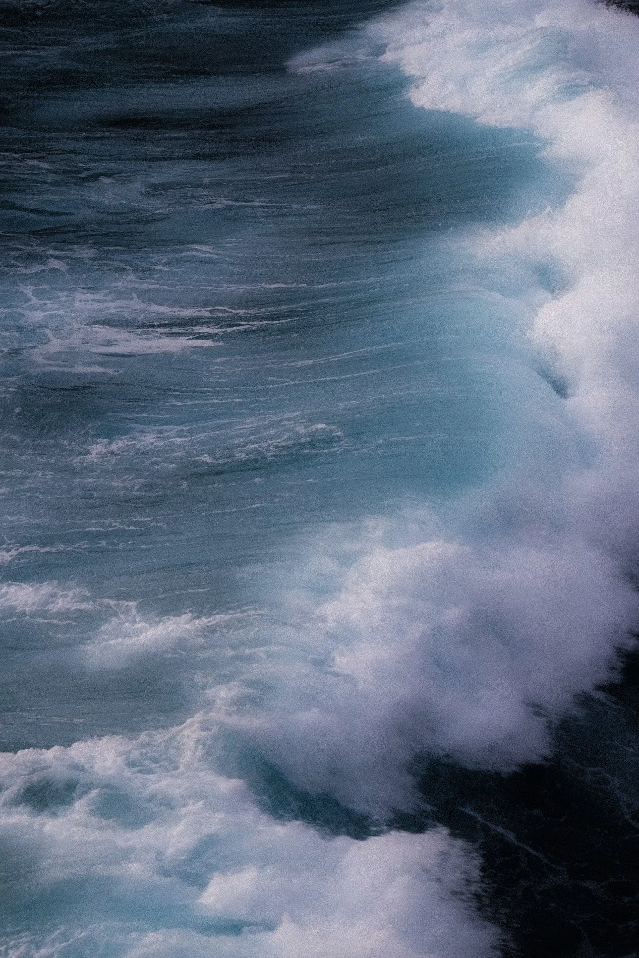 "Blue Surge"
A wall of ocean breaking into white foam, Nusa Lembongan, Indonesia.