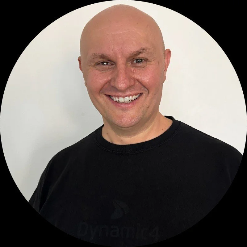 Headshot picture of changemaker Ben Pecotich