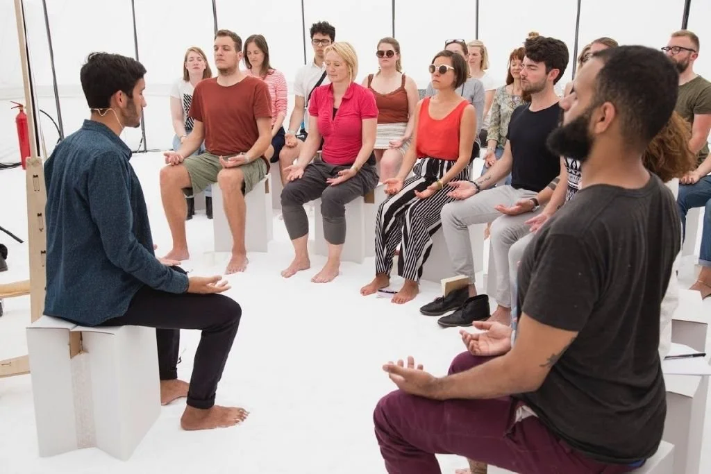 Al Jeffery guiding a meditation session with changemakers