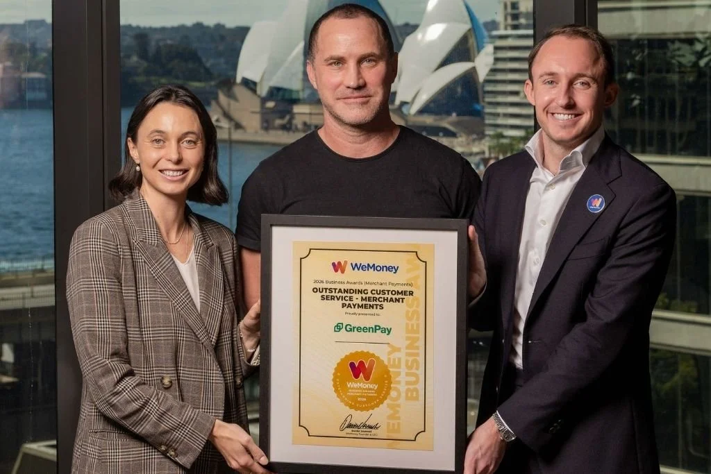 Glenn Bartlett and co-founder Maddi Ingham receiving a WeMoney award