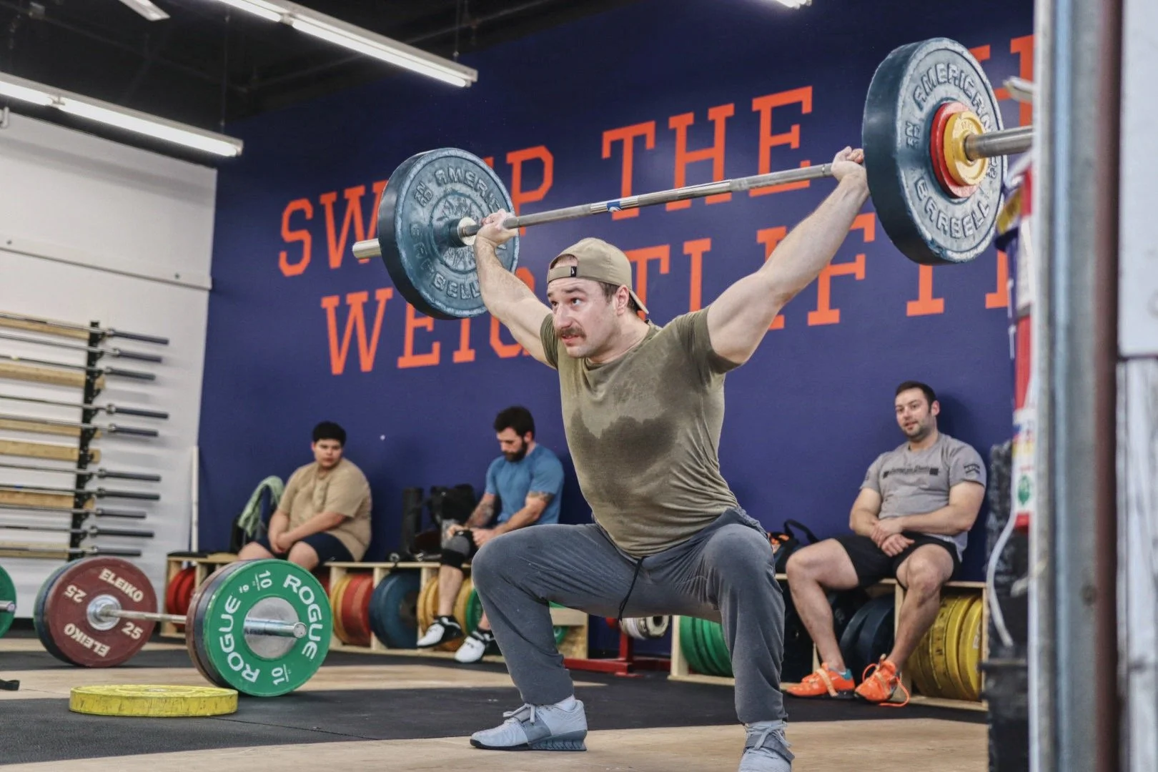 why do i jump forward in the snatch?