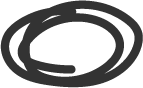 A black, oval-shaped ink mark on a white background.