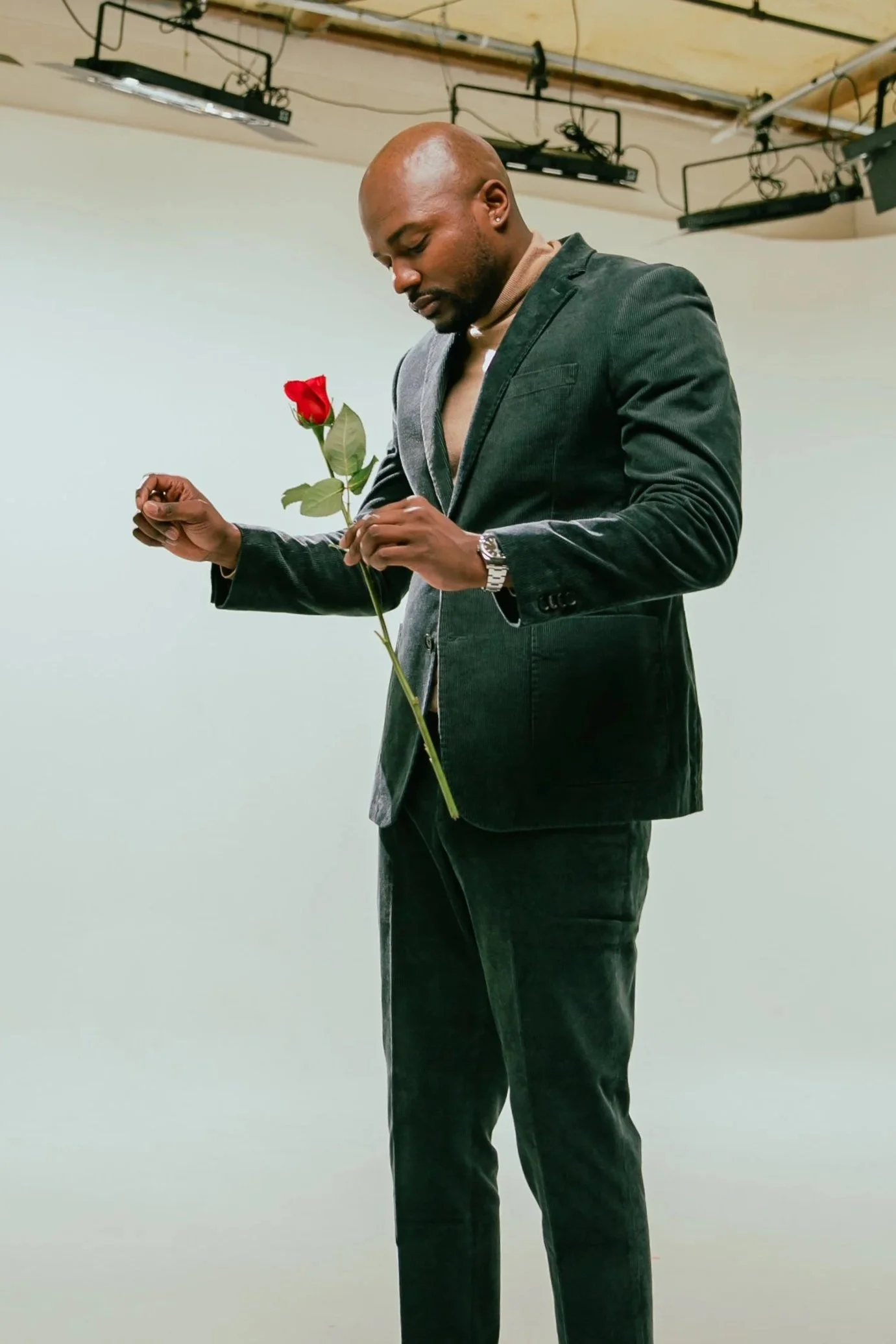 For The Few Records artist portrait holding red rose