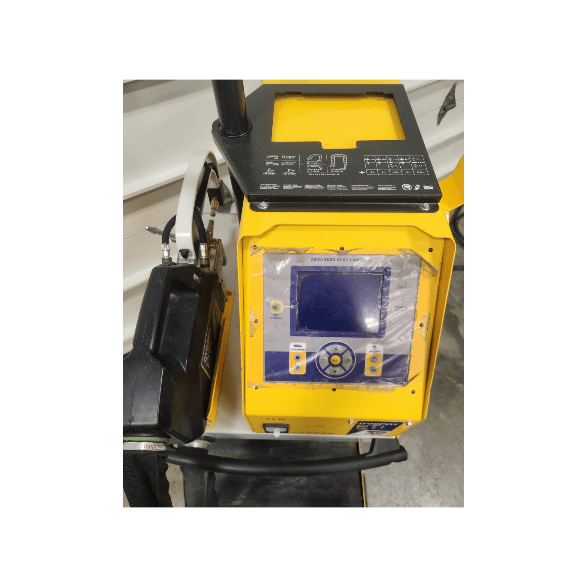 front view of spot welder with control screen and welding cable connections