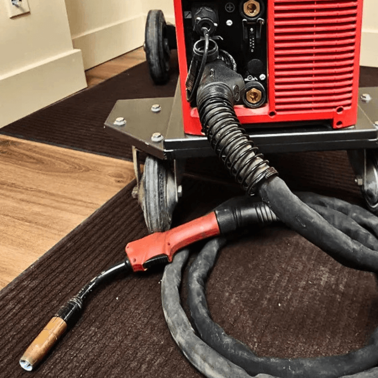MIG welding torch and cable setup