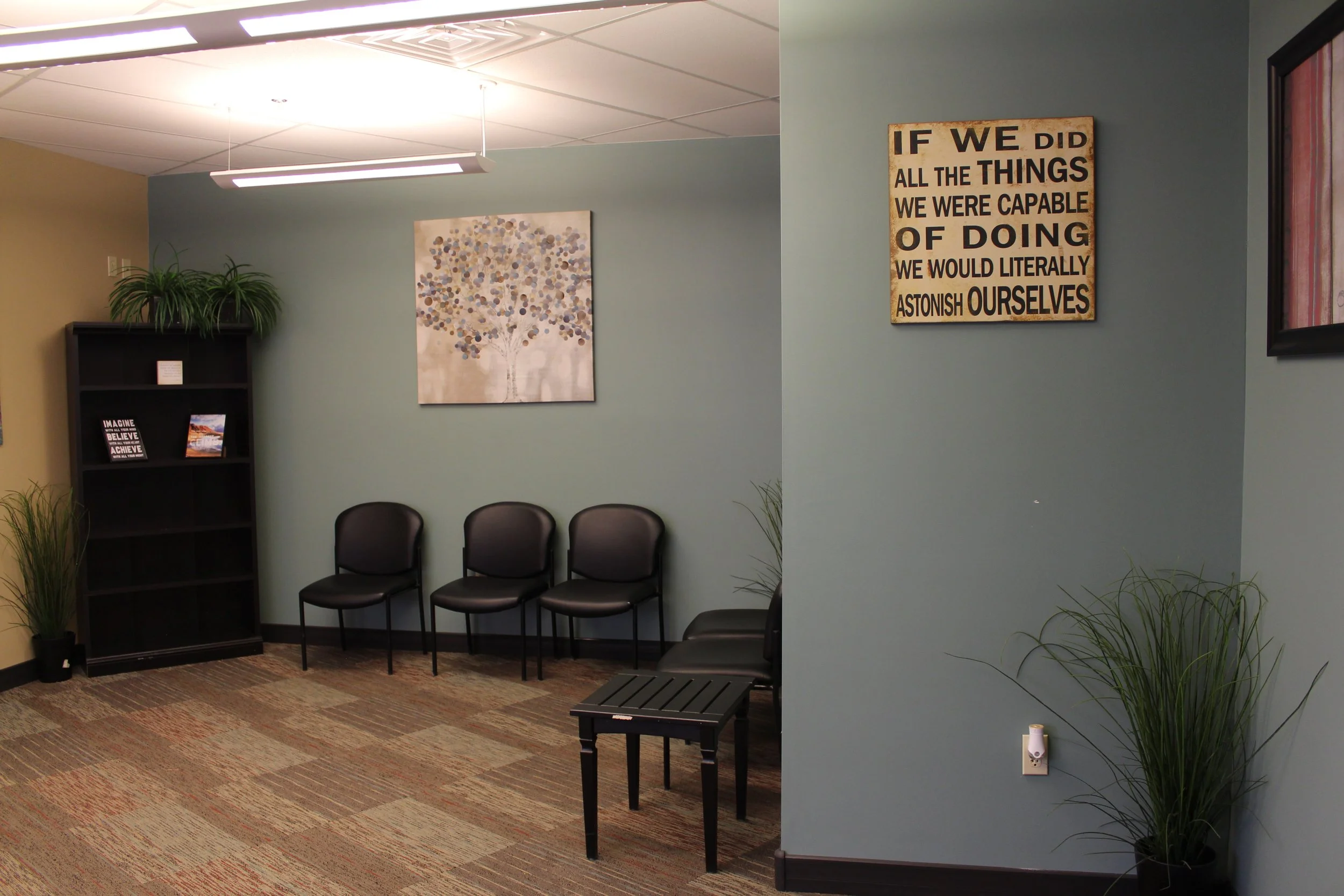waiting room containing inspirational sign
