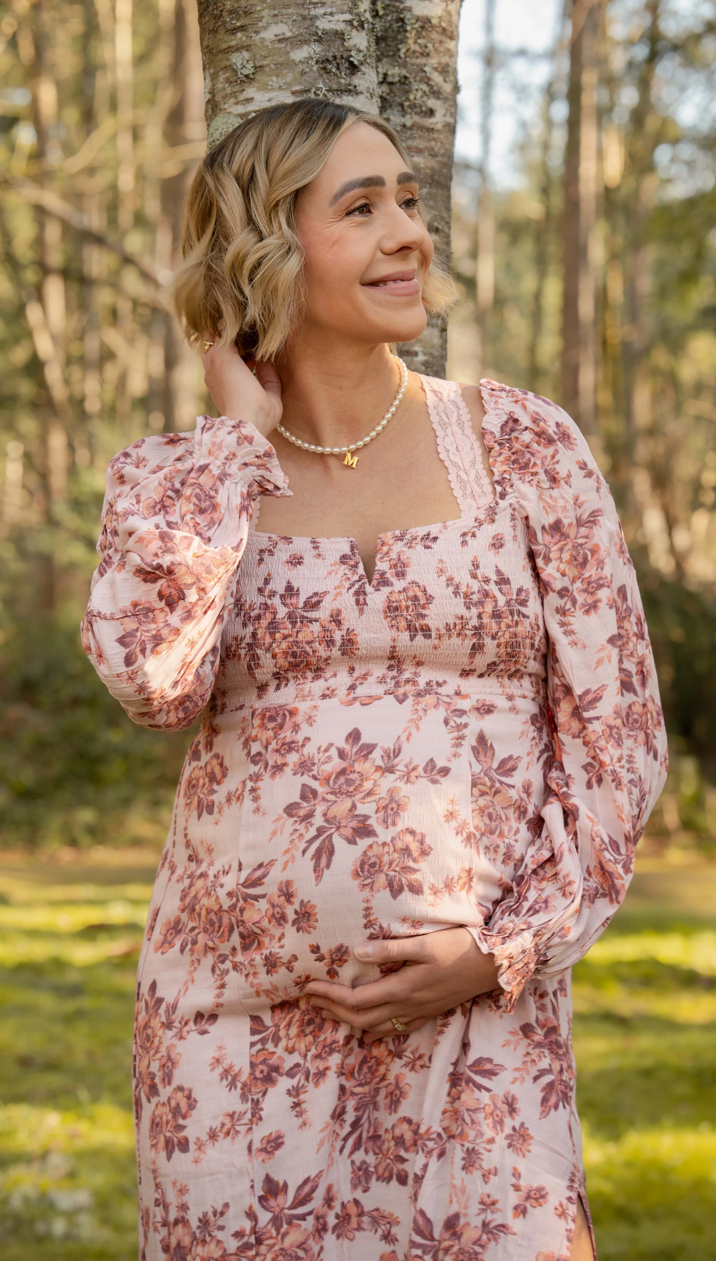 Radiant and confident - expecting mom cradles her baby bump with grace and style in Covington, Washington.