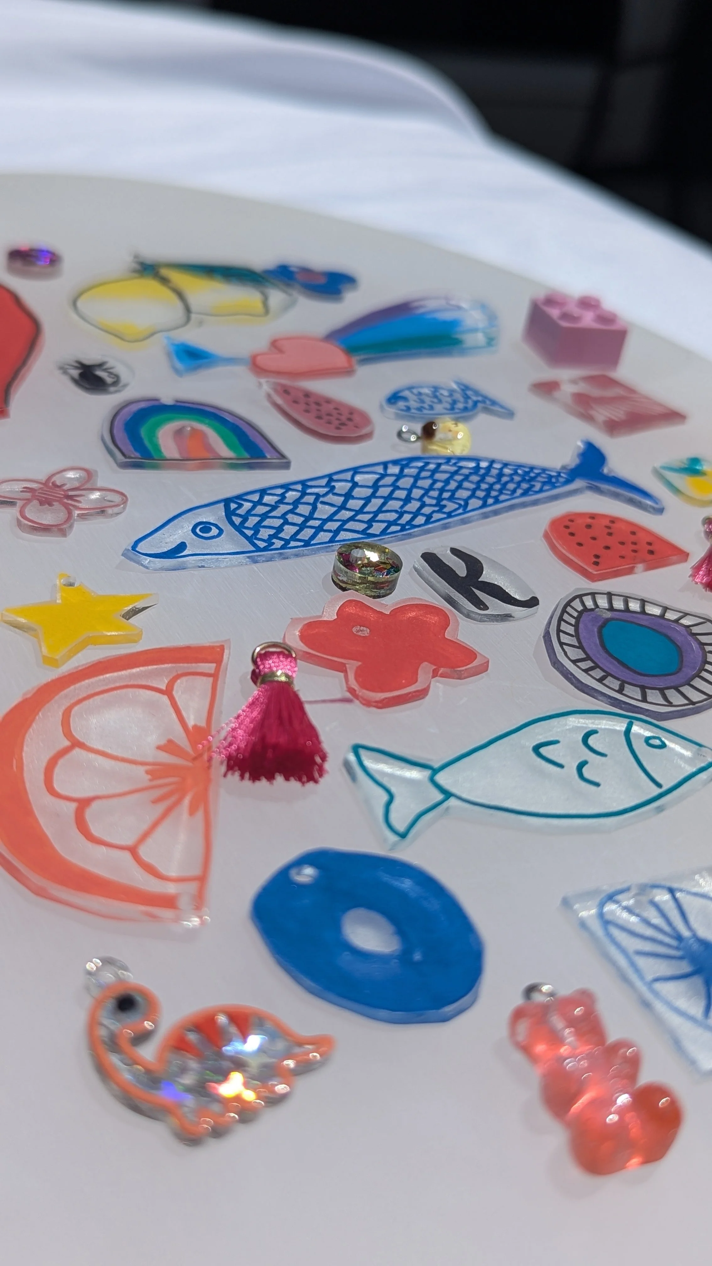 CHARMED IM SURE
Using Shrinky Dinks to create your own personalised charms. In this workshop you add them to your own charm ladder necklace or make a pair of earrings for your own signature piece. I always have a small stash of extra findings to elev