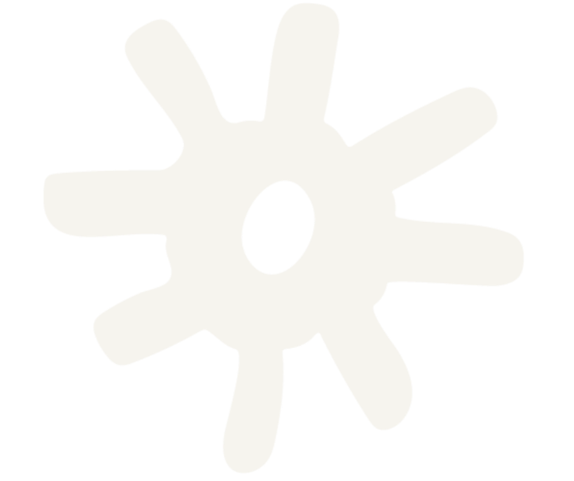 A white abstract shape resembling a gear or flower with a central hole, on a black background.
