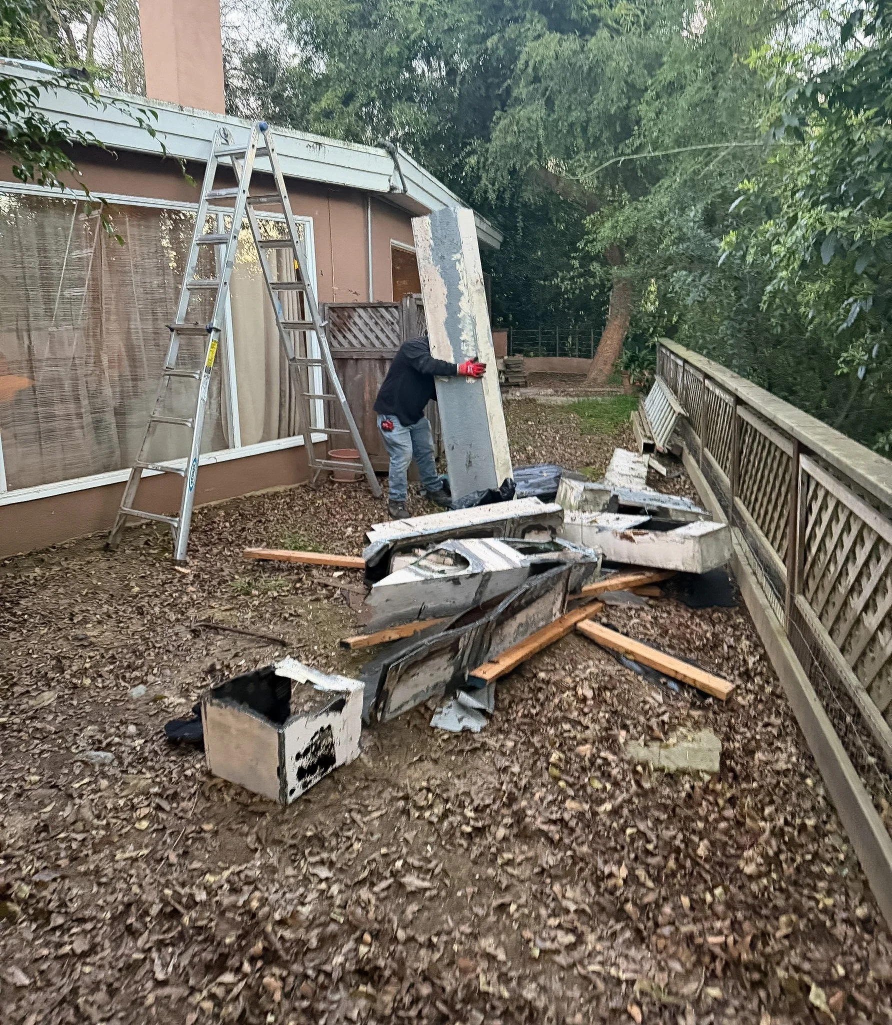 Old  HVAC unit removal and debris hauling in progress by Hauling-4-u in Santa Barbara, CA.