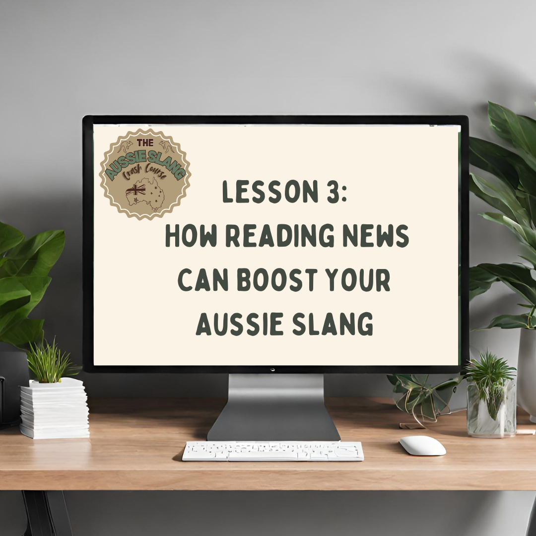 Computer monitor displaying a lesson titled 'Lesson 3: How Reading News Can Boost Your Aussie Slang'. Logo in the top left corner reads 'The Aussie Slang Crash Course'. Desk with plants and office supplies.