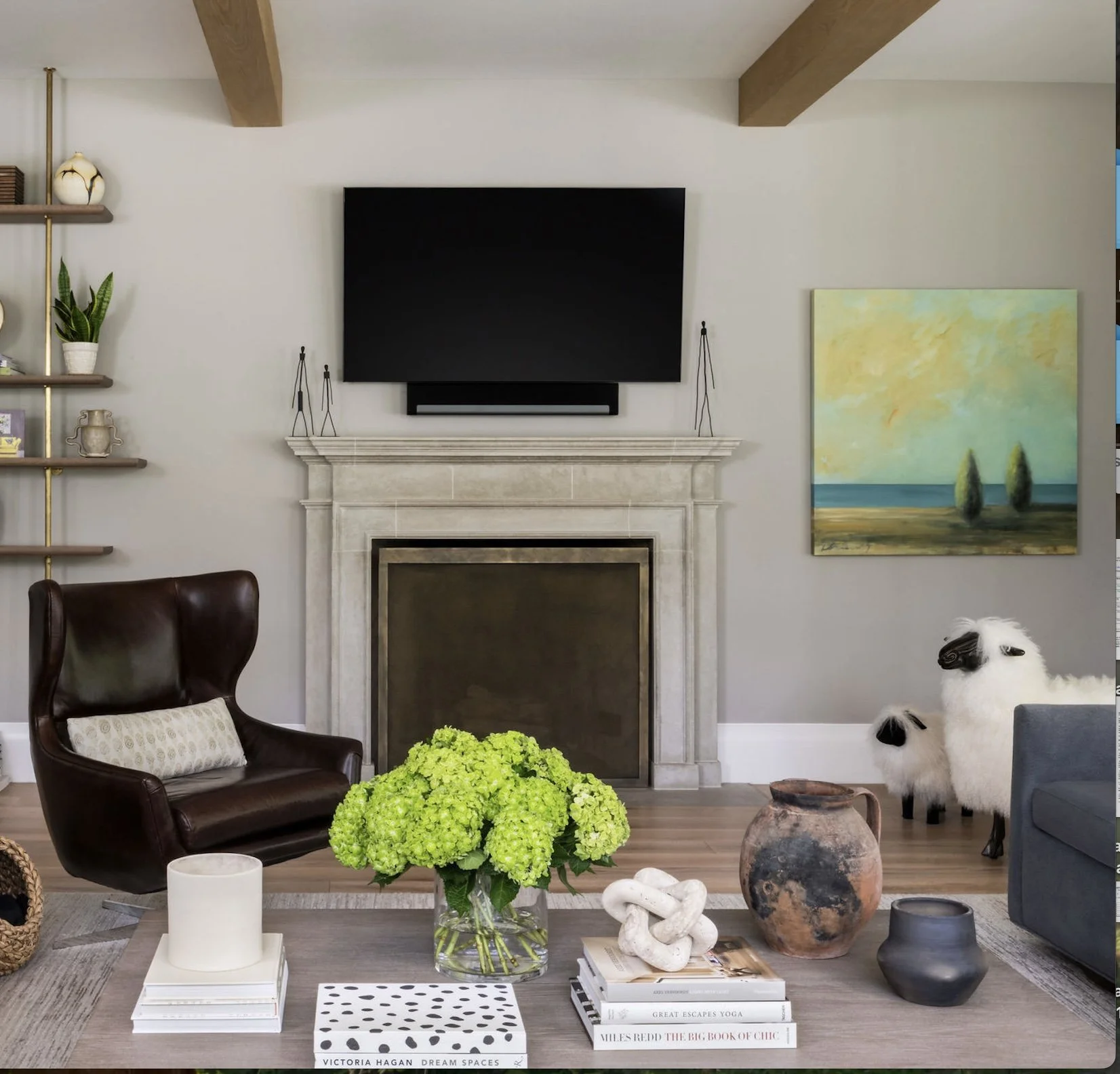 Whimsical sheep-shaped footstools standing in a modern living room designed by Casa Millie.