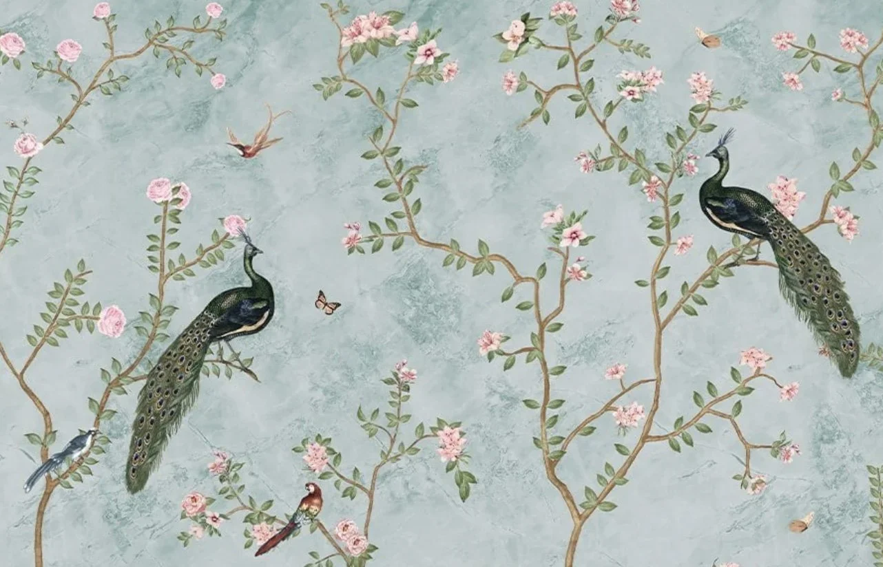 Detailed peacock chinoiserie wallpaper in a powder room featuring exotic birds and botanical patterns.