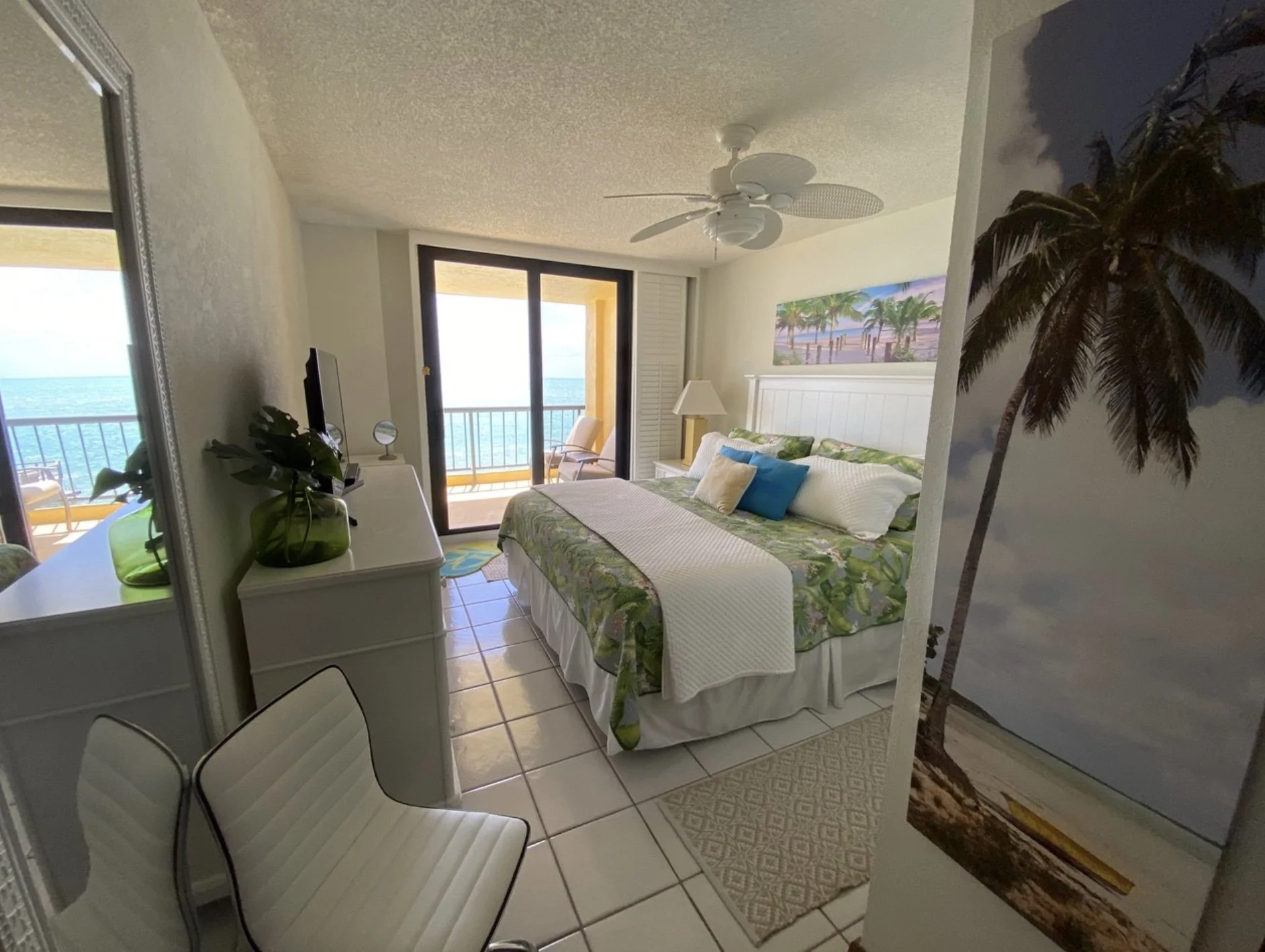 riginal dated interior of a Key West condo bedroom before the Casa Millie team began the reconfiguration and refresh process.