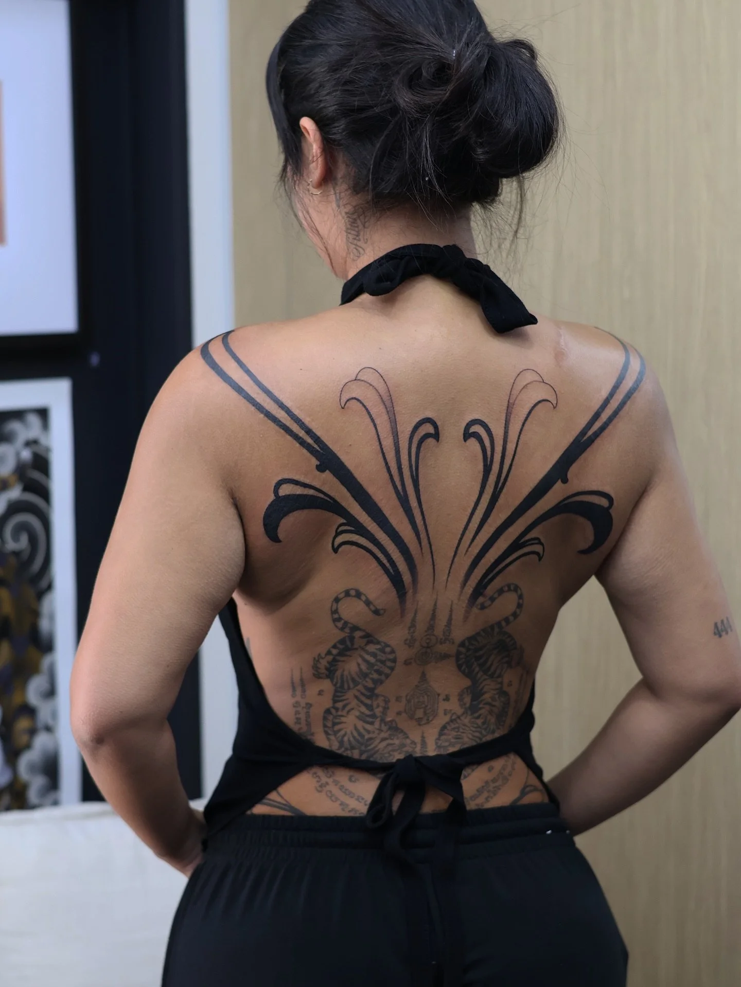 She&rsquo;s Bold. She&rsquo;s beautiful!

This is not a tattoo you ease into, it&rsquo;s built to take space and stay dark. 

A Simple decorative upper back piece to finish off the coverage, lower back decorative foliage healed by me, middle cultural