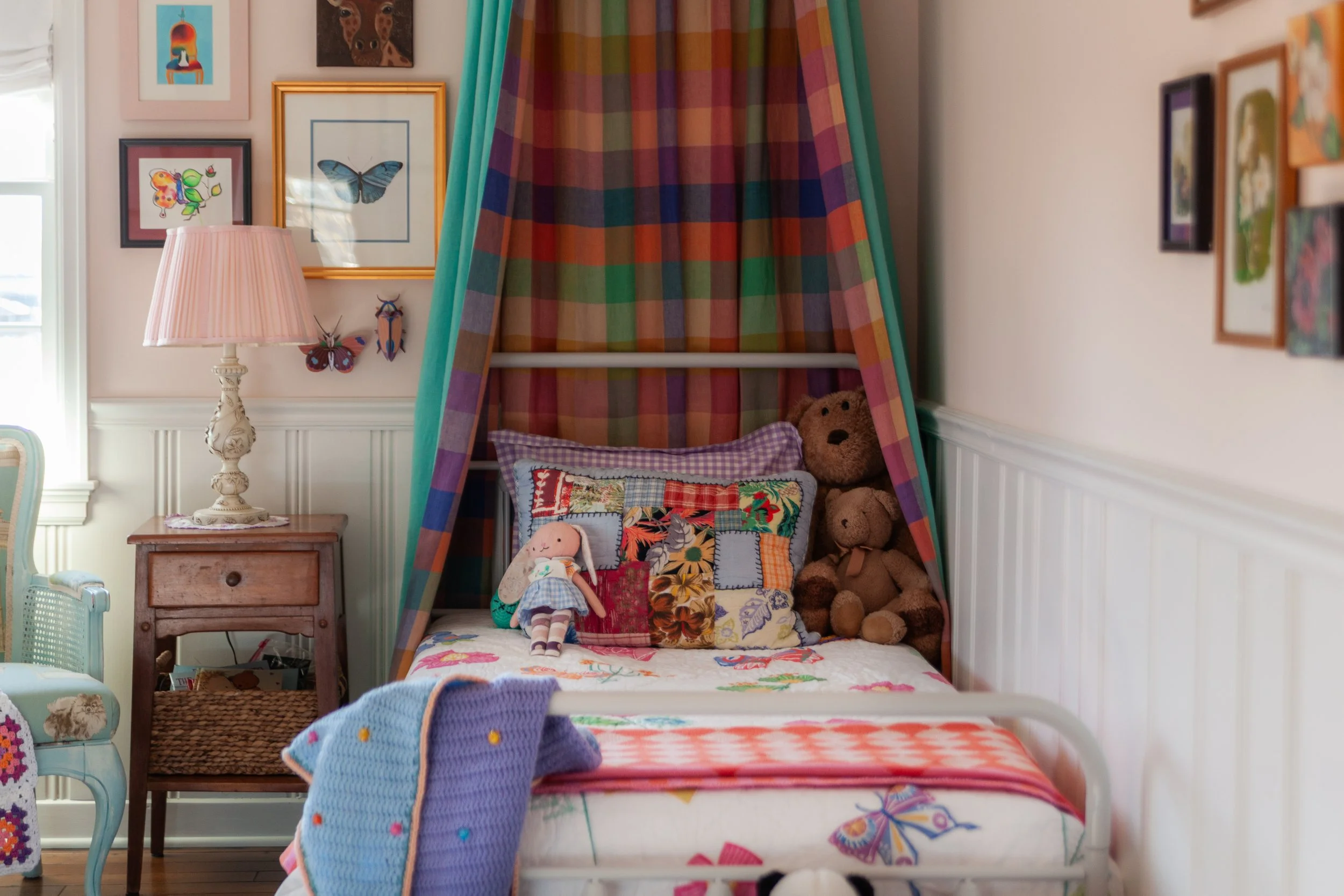 Complete view of whimsical heritage children's room designed by Jessie Surber Interiors in Carmel