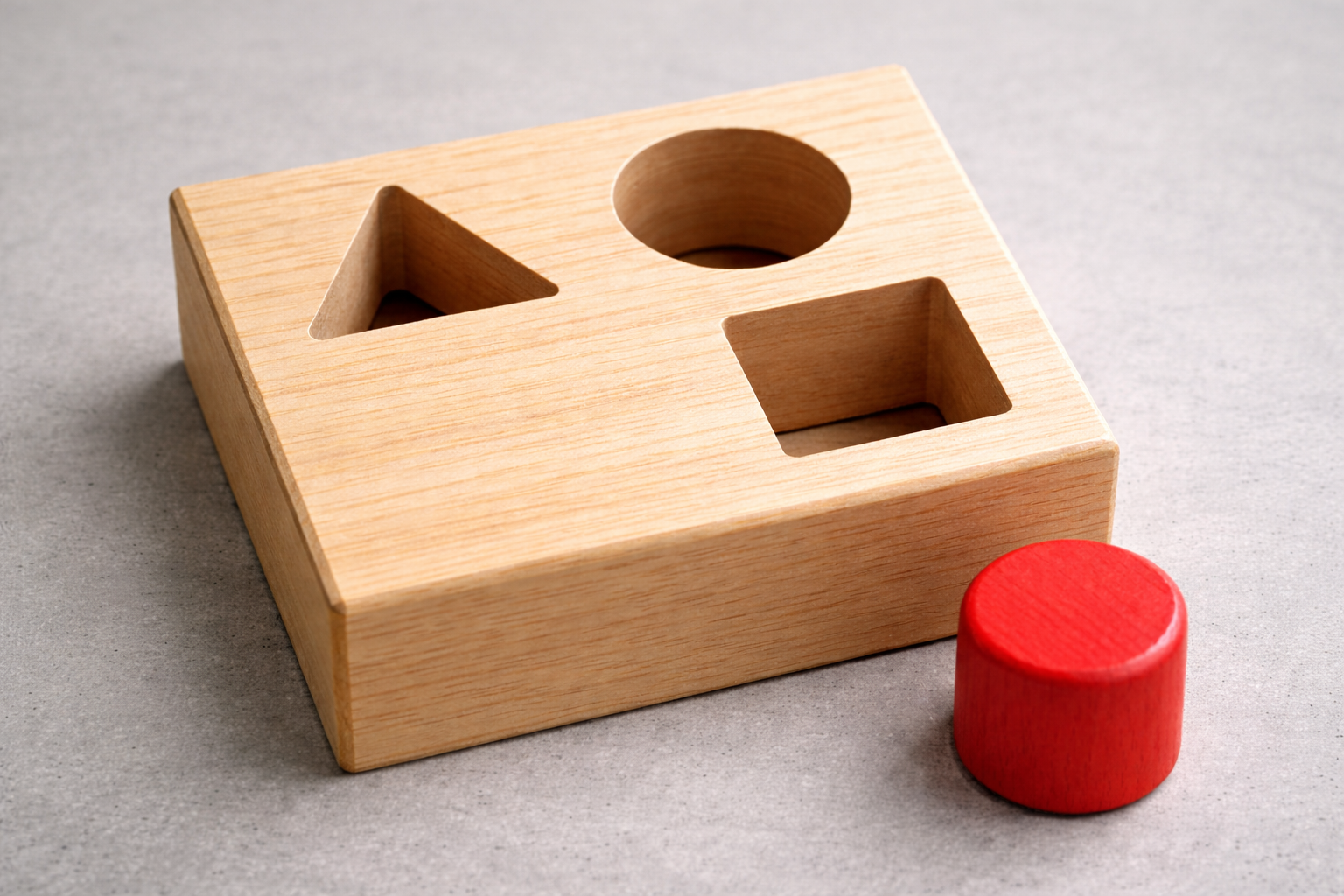 wooden board with different holes representing finding the right client niche