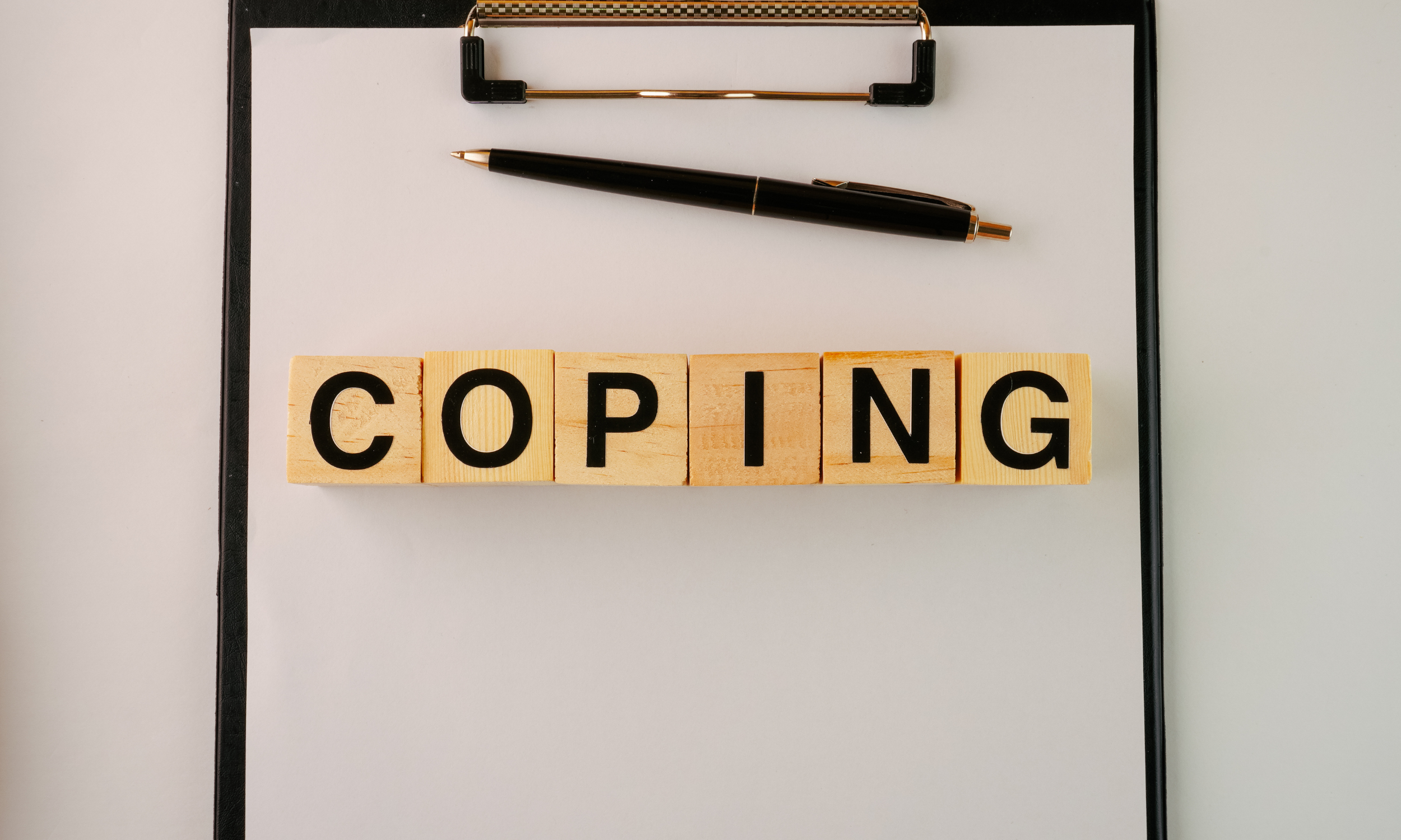 the word "coping"