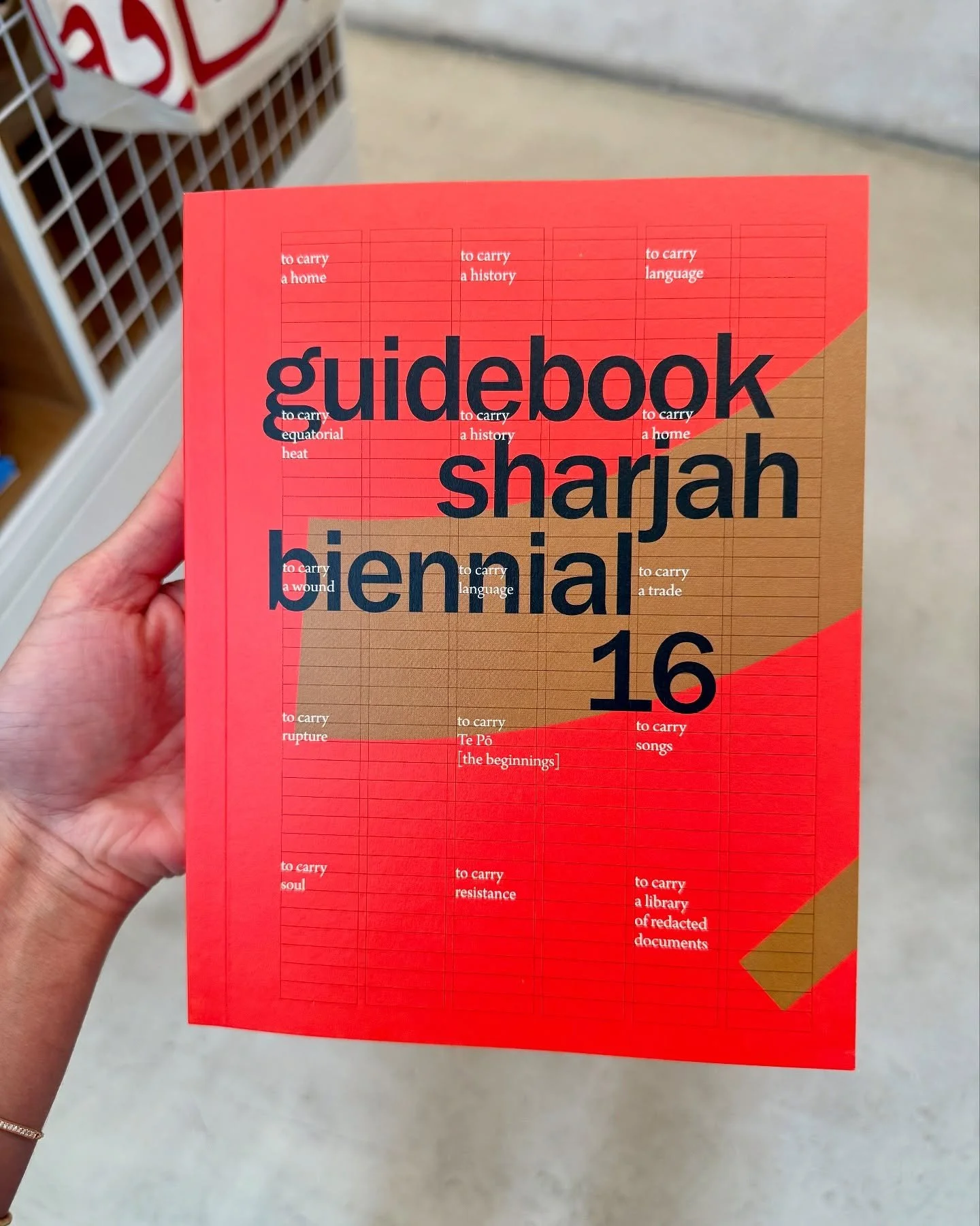 Wandering through the 16th Sharjah Biennial is like stepping into a living archive of migration, memory, and resilience. Curated by Alia Swastika, Amal Khalaf, Megan Tamati-Quennell, Natasha Ginwala, and Zeynep &Ouml;z, to carry brings together over 