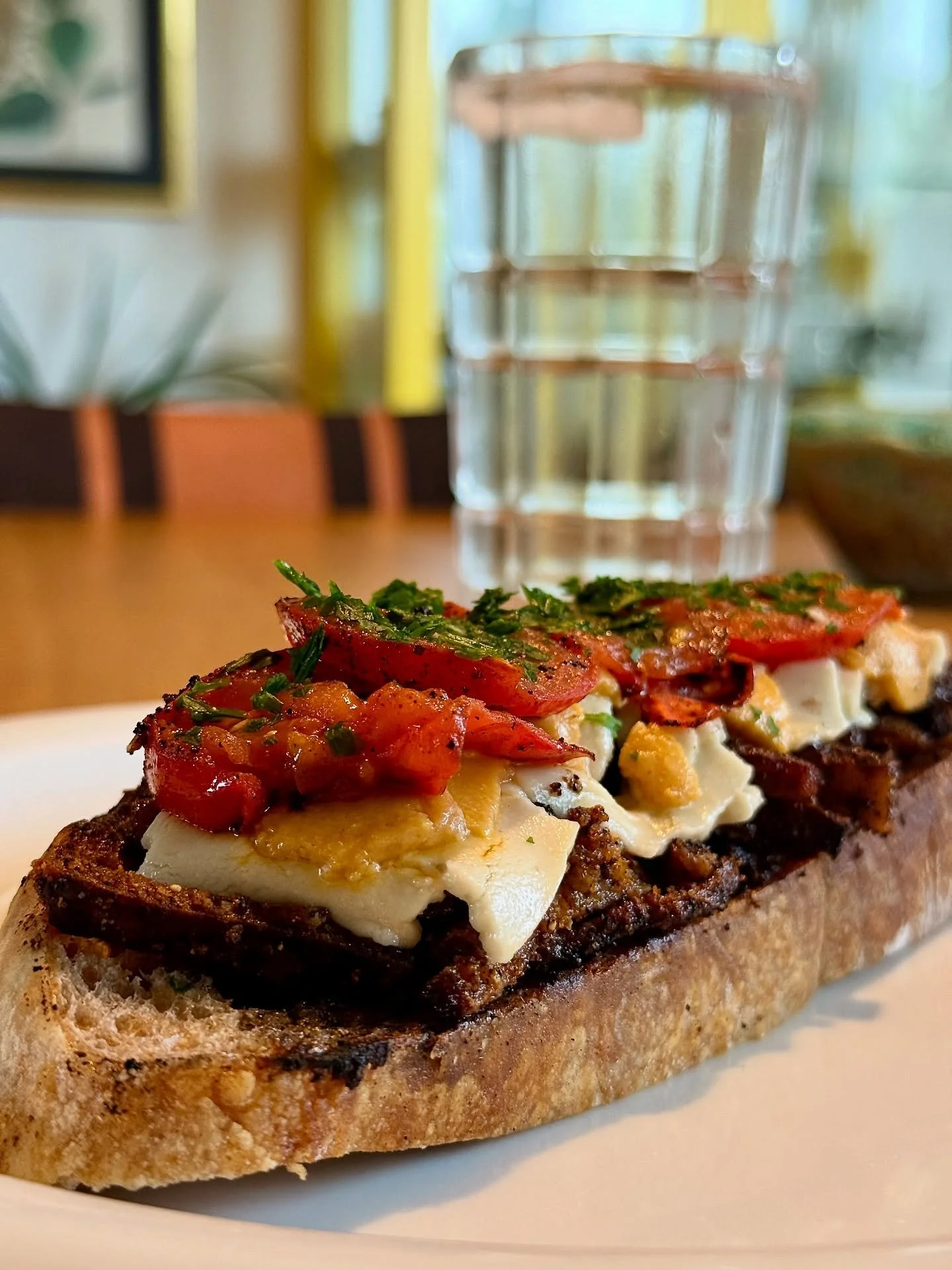Breakfast is the most important meal of the day &mdash; so start it the Casheury way 🧀☀️

Toasty sourdough topped with braised tofu, melted Bianco, gooey Cheddo, juicy tomatoes, and fresh herbs &mdash; the ultimate comfort combo.
Rich, creamy, and j