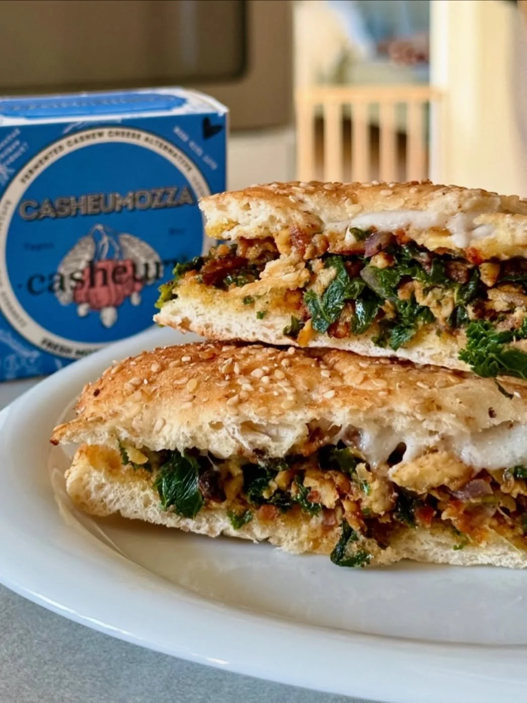 A proper winter warmer ❄️🔥
Hot grilled sourdough sandwich loaded with marinated tempeh, sweet red onion, and earthy green kale &mdash; with casheumozza taking centre stage.

Melty, rich, and deeply satisfying, our versatile casheumozza is the star o