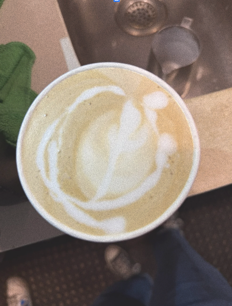 Coffee cup with latte art.