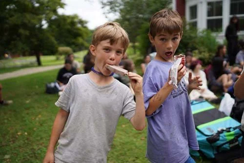 Campers having a popsicle for snack