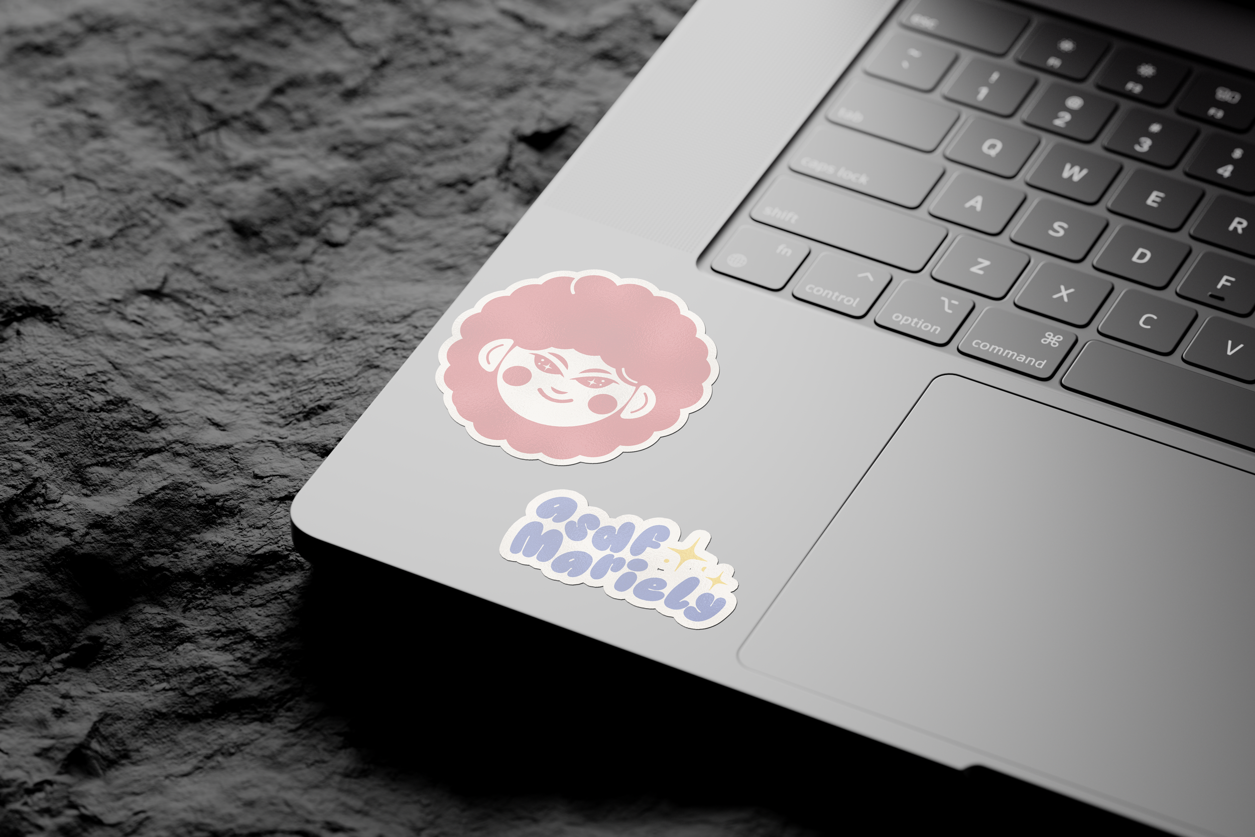 03 Laptop Sticker On Rock Mockup.png