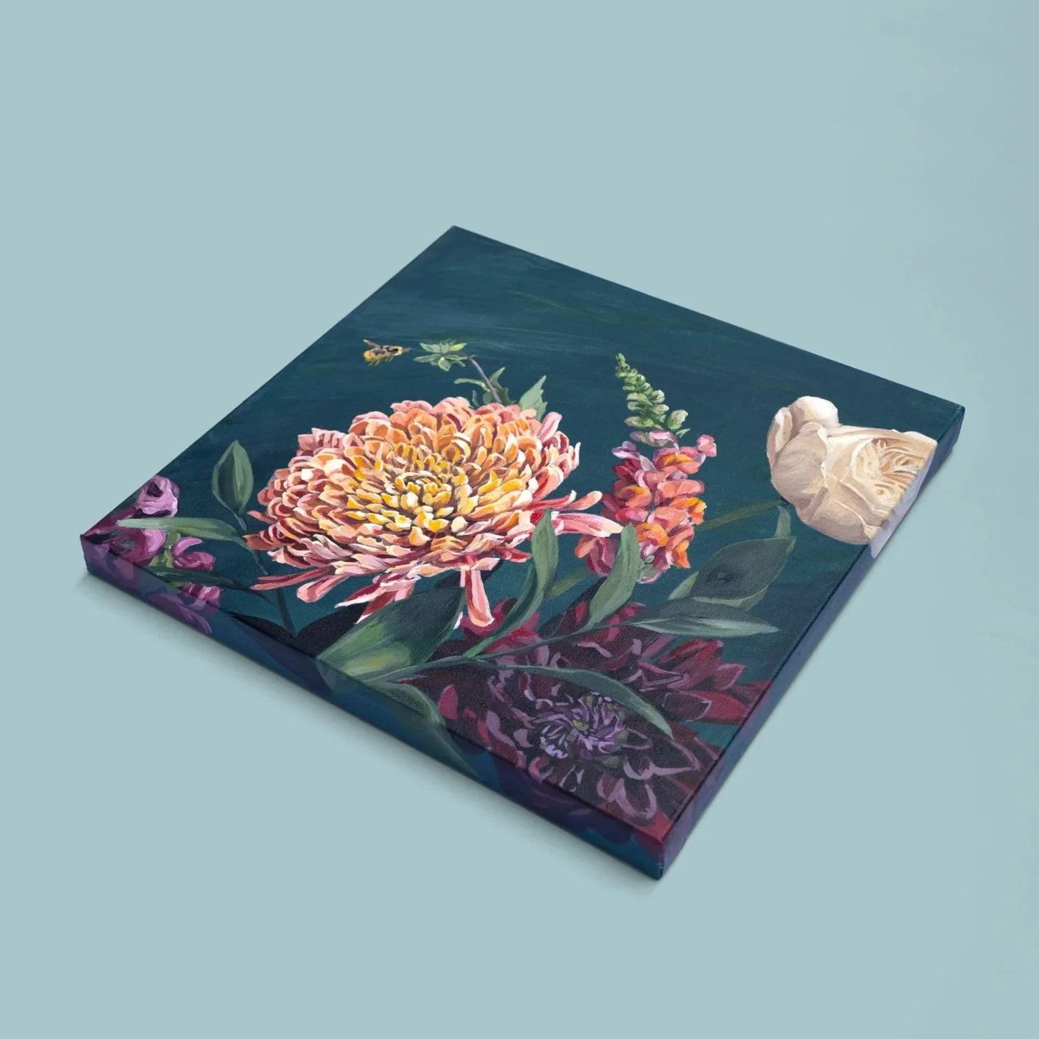 custom-floral-commission-shown-laid-on-light-blue-background.jpg
