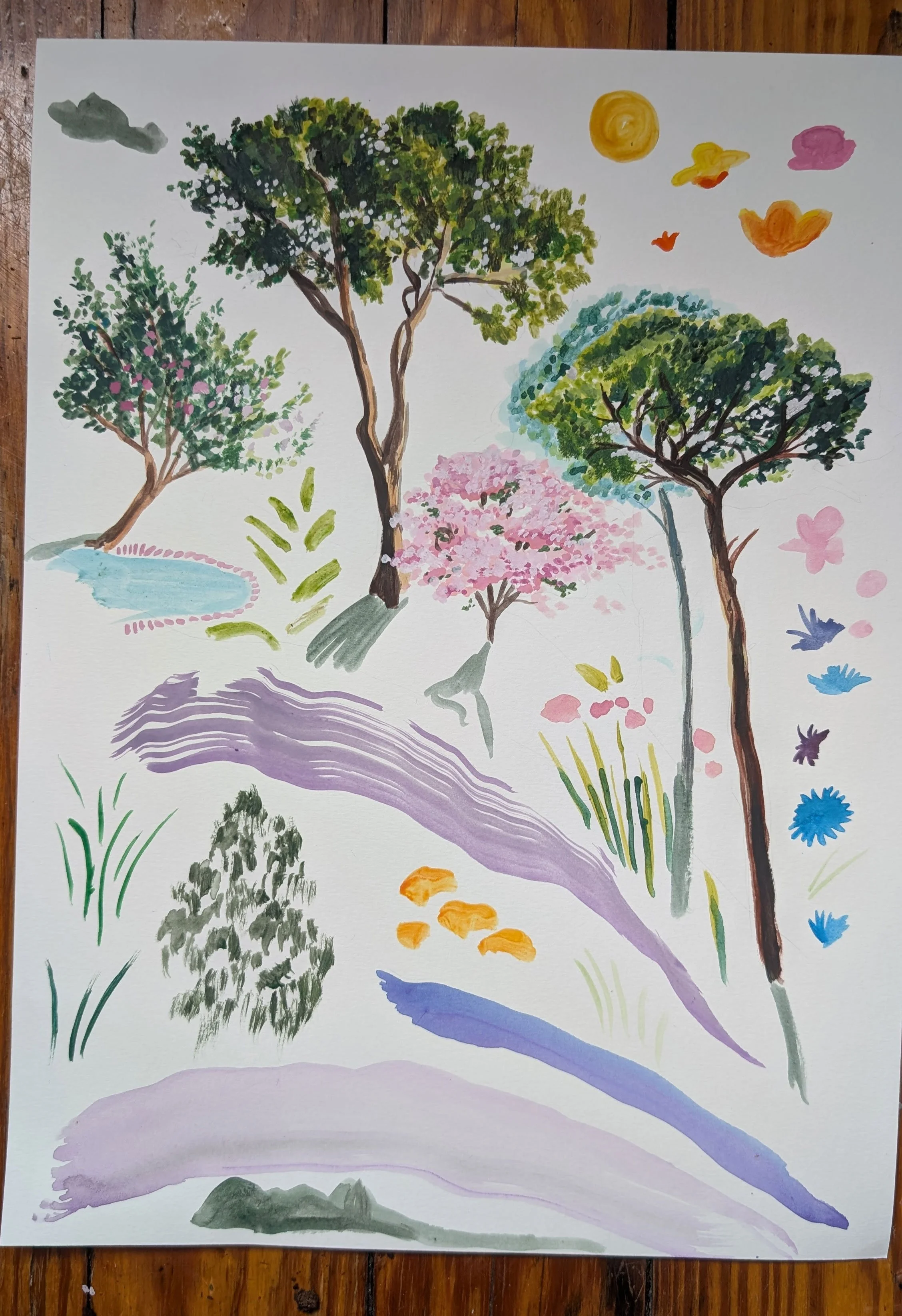 Colourful trees and splashes of paint to inform mural