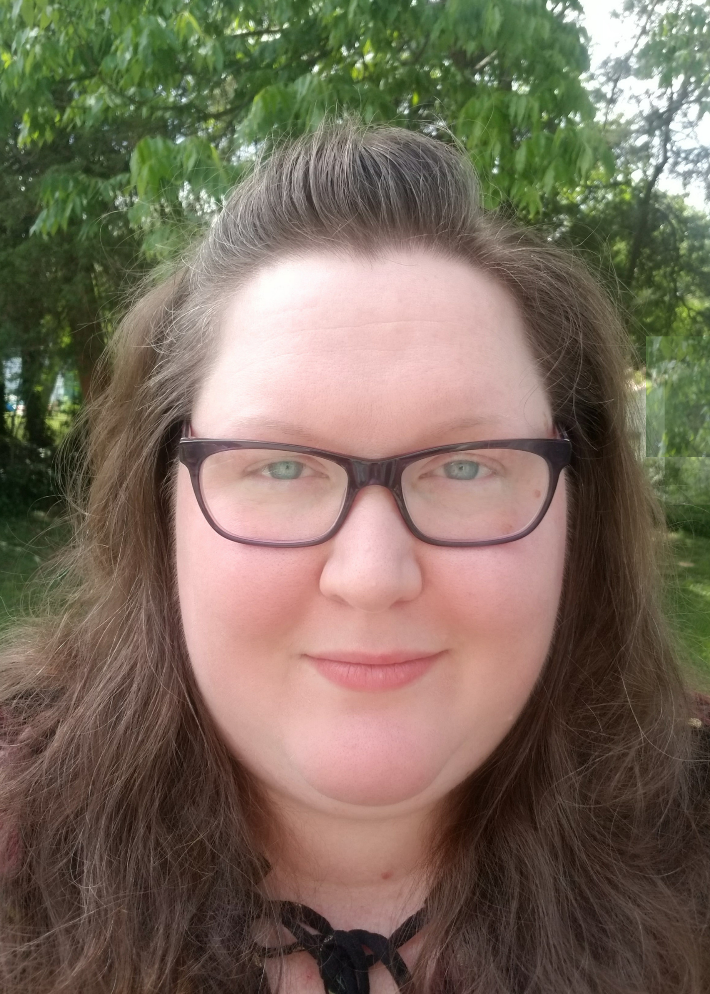 Headshot of Shannon Kilroy, LPC, therapist at Sunflower Radiance Counseling.
