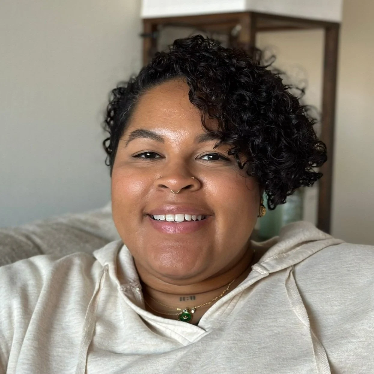 Headshot of Tiayra Villafane, LAPC, therapist at Sunflower Radiance Counseling.