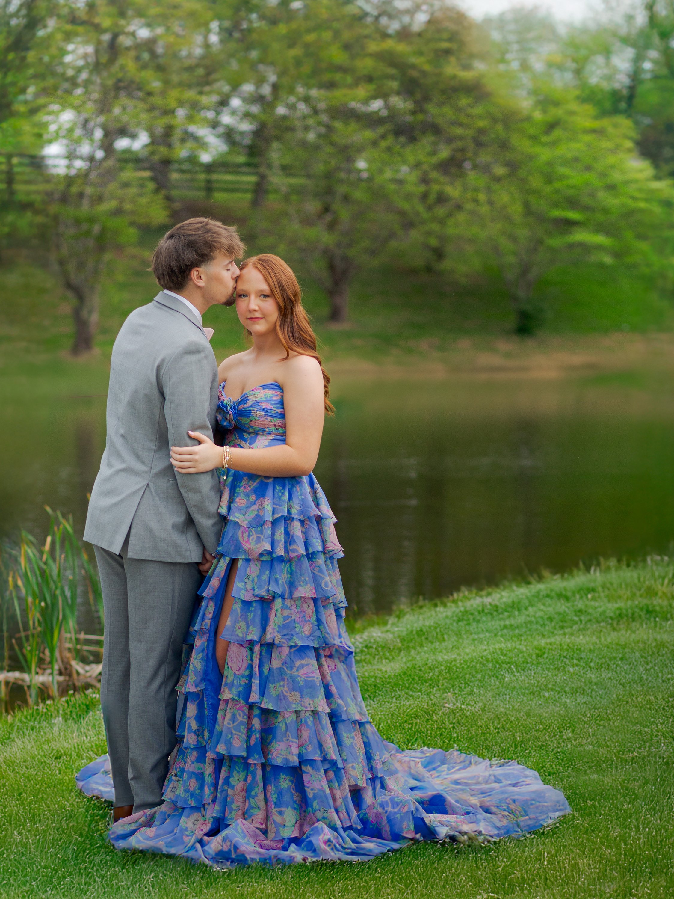 couple-prom-portrait-beside-pond-sherri-hill-dress