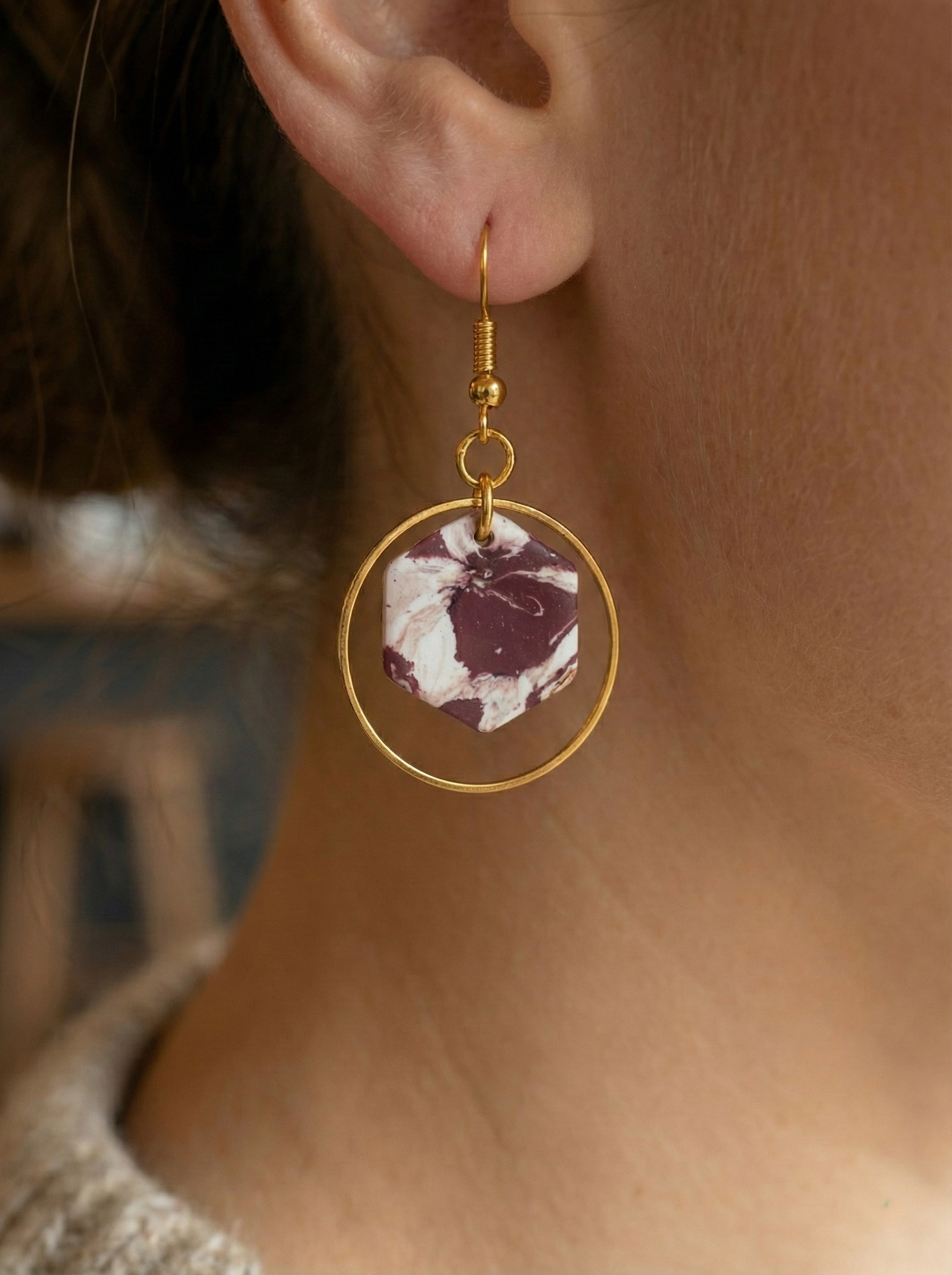 white and maroon marble with gold dangle zoomed in mockups.png