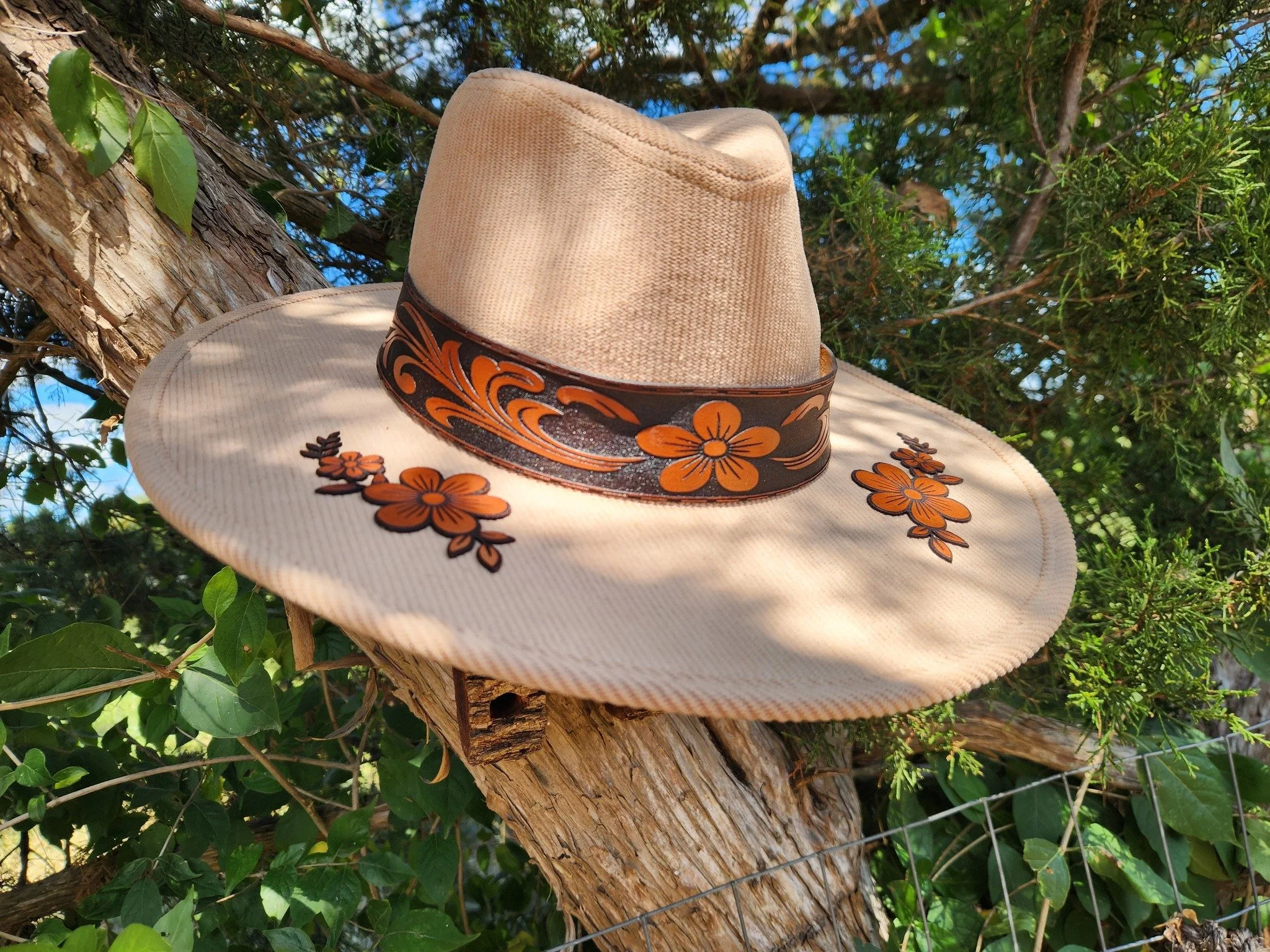 tan cowgirl with leather flowers front.jpg
