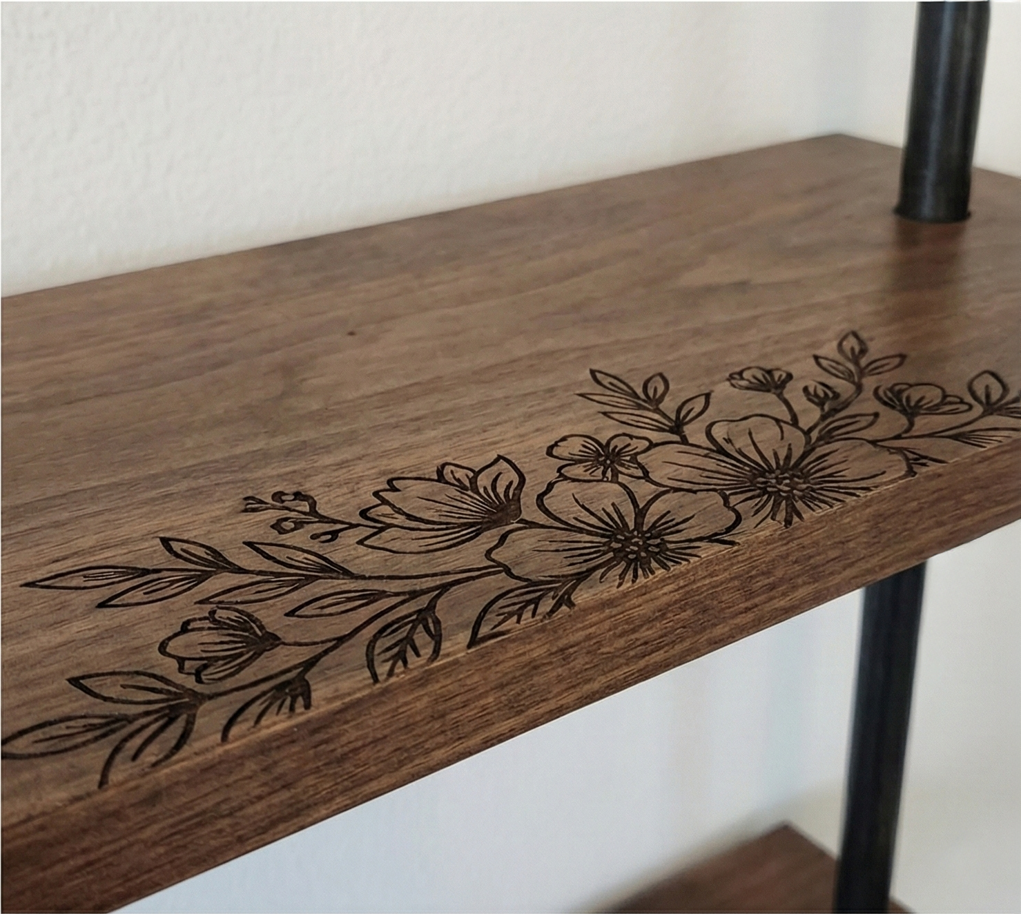 shelves with engravings closeup mockup.png